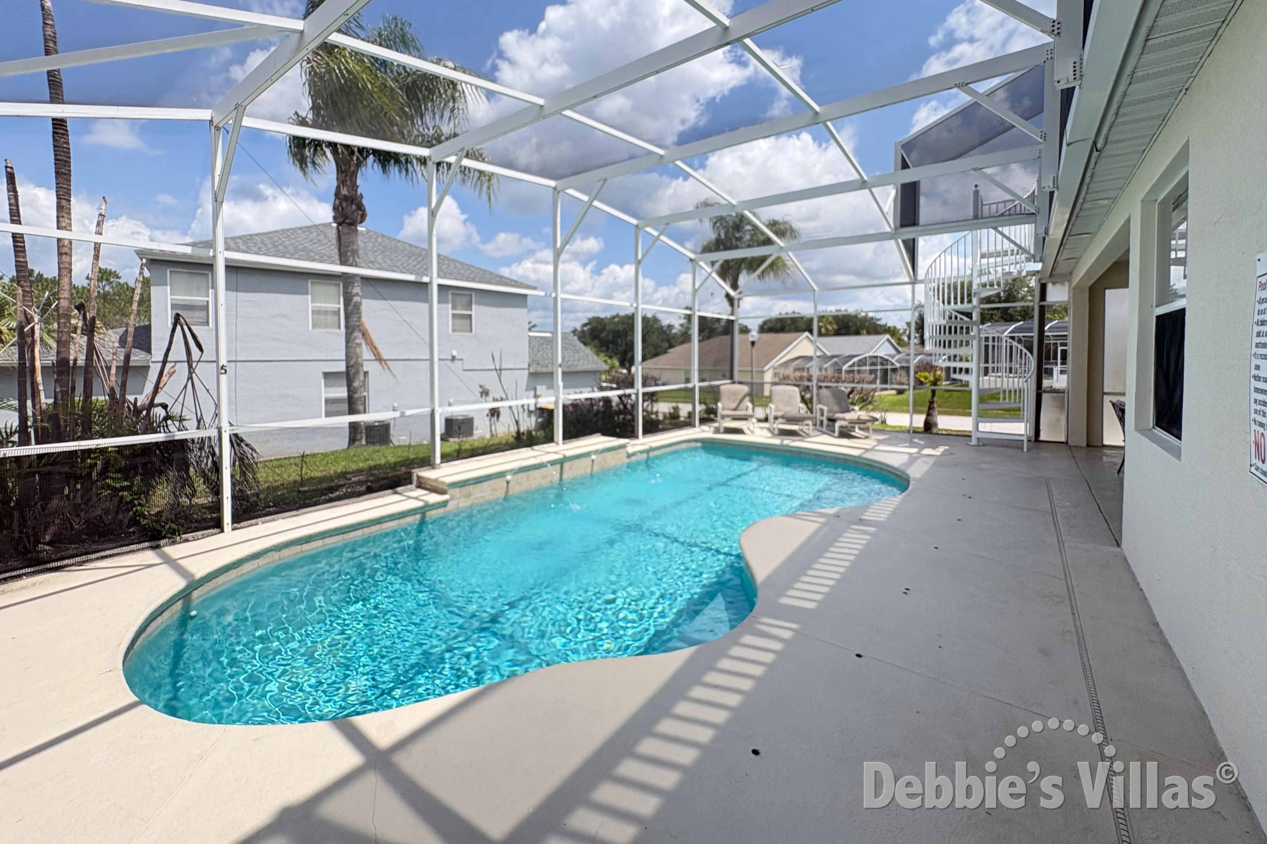 West-facing pool at this vacation villa on Highlands Reserve in Davenport 