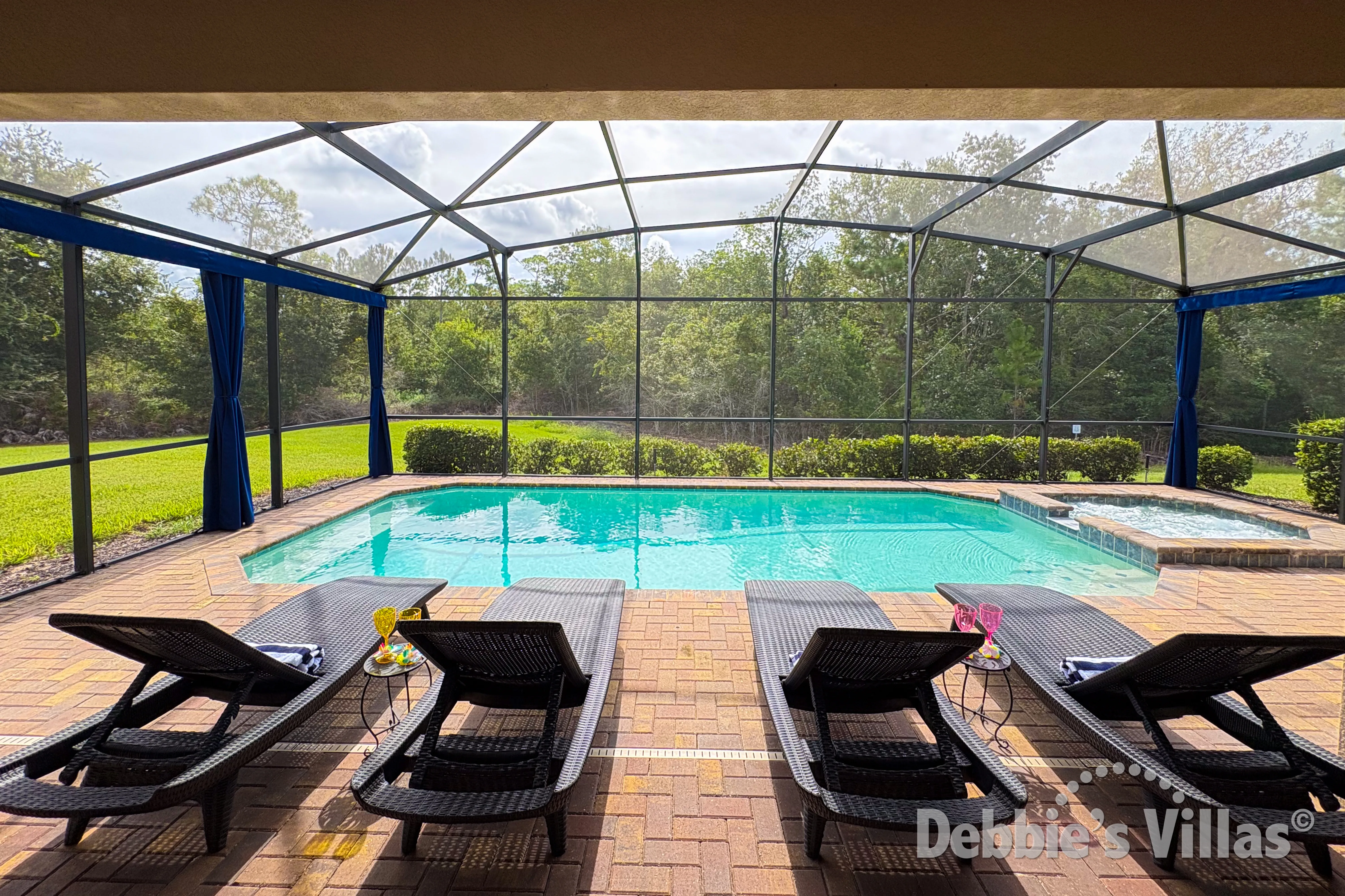 Southeast-facing pool and spa at this vacation villa on Windsor at Westside in Kissimmee 