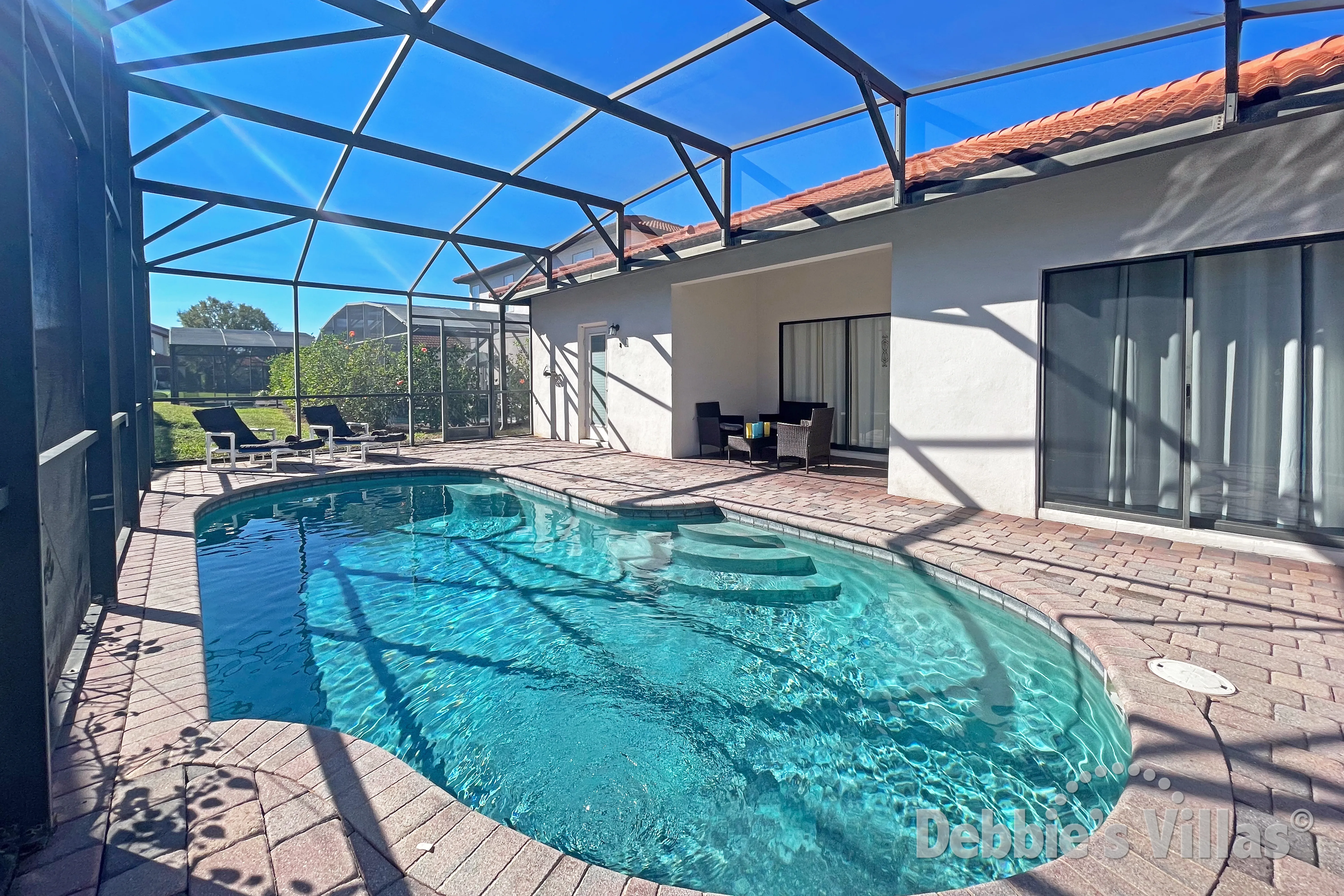 Easy access steps into the pool at this Clermont vacation villa