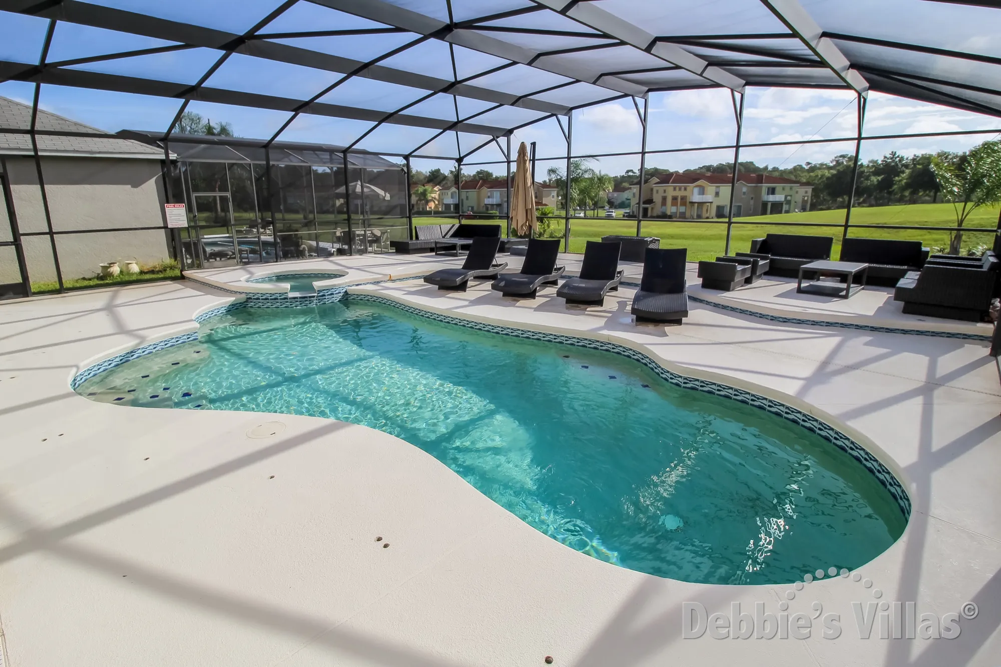 Davenport villa with a spacious pool and spa deck