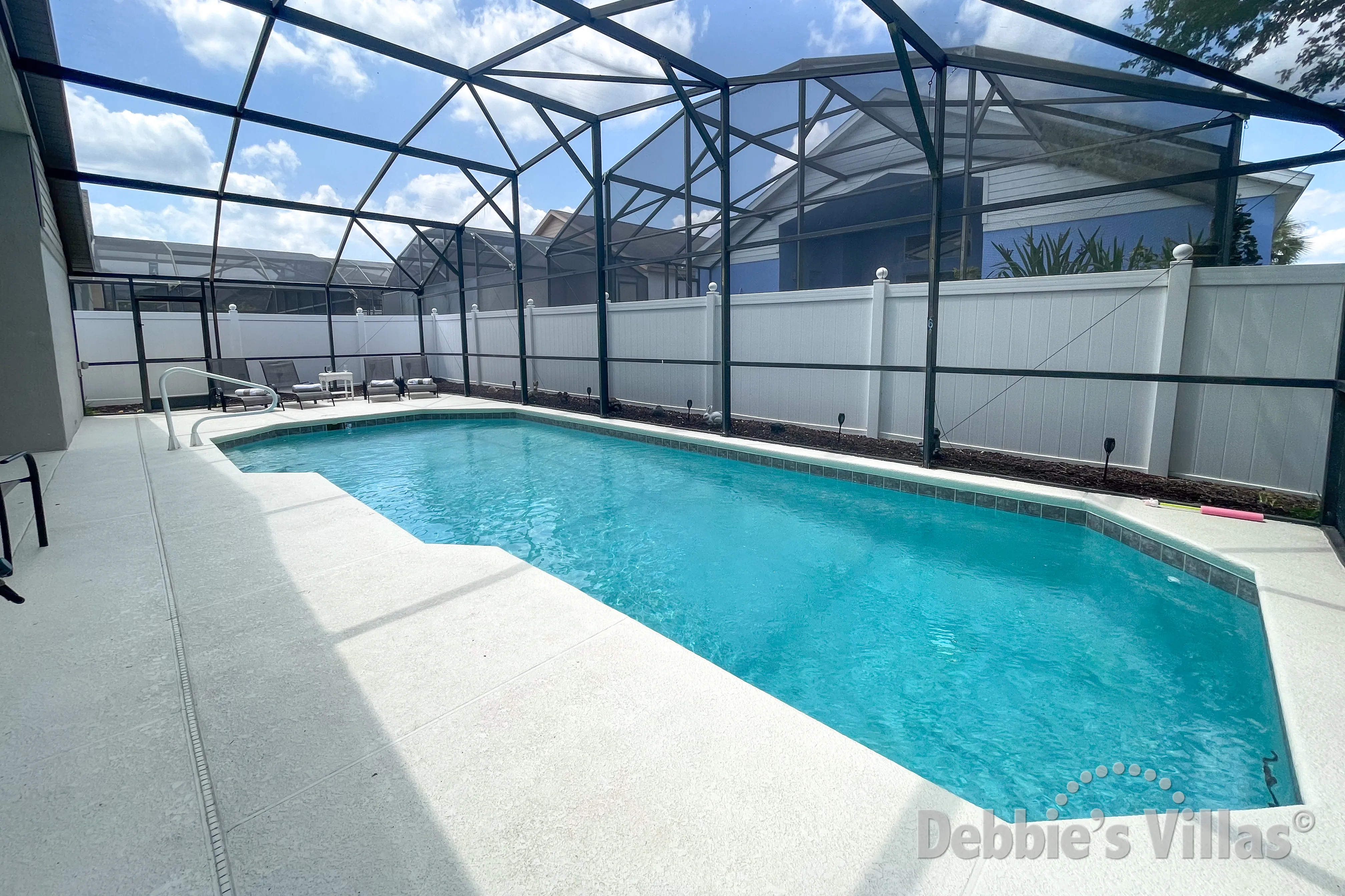 Southwest-facing pool at this vacation villa on Indian Creek in Kissimmee