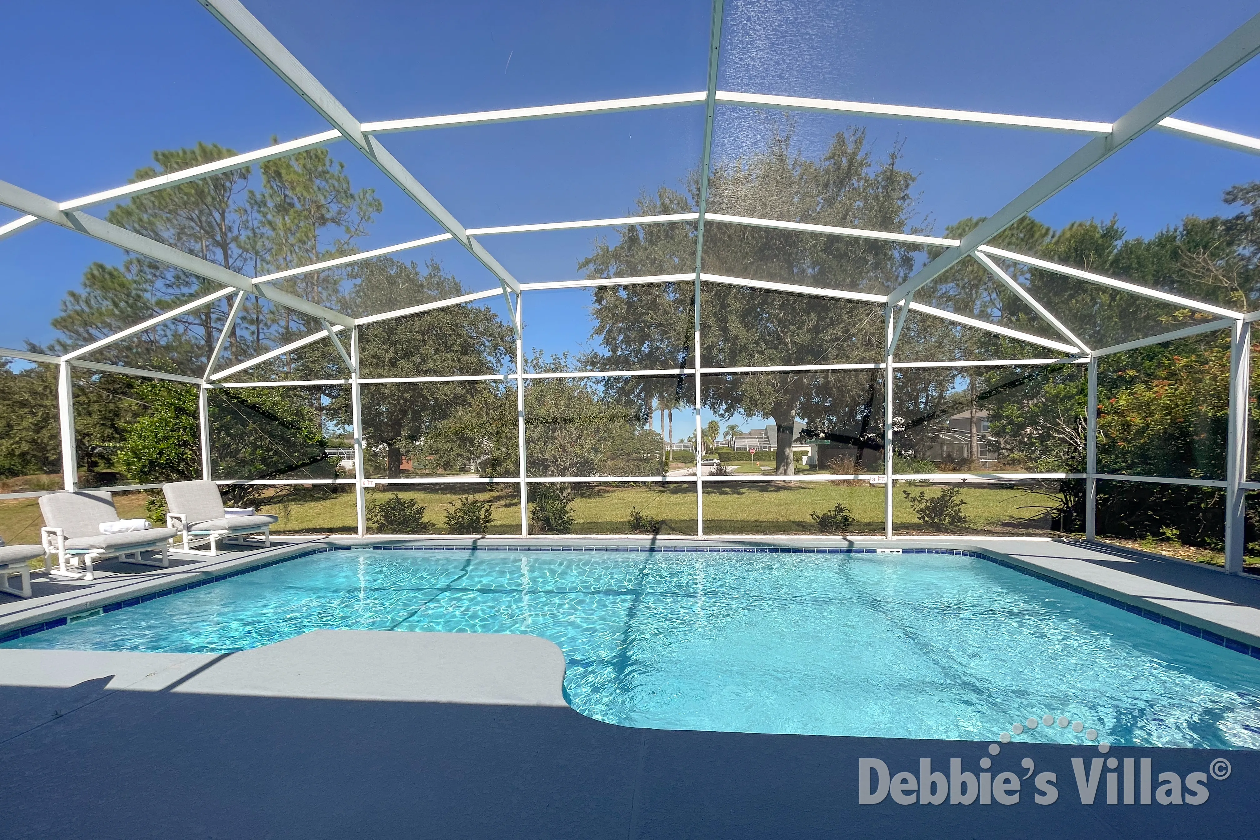 Sun-drenched pool deck with no overlooking neighbours at this Davenport vacation villa