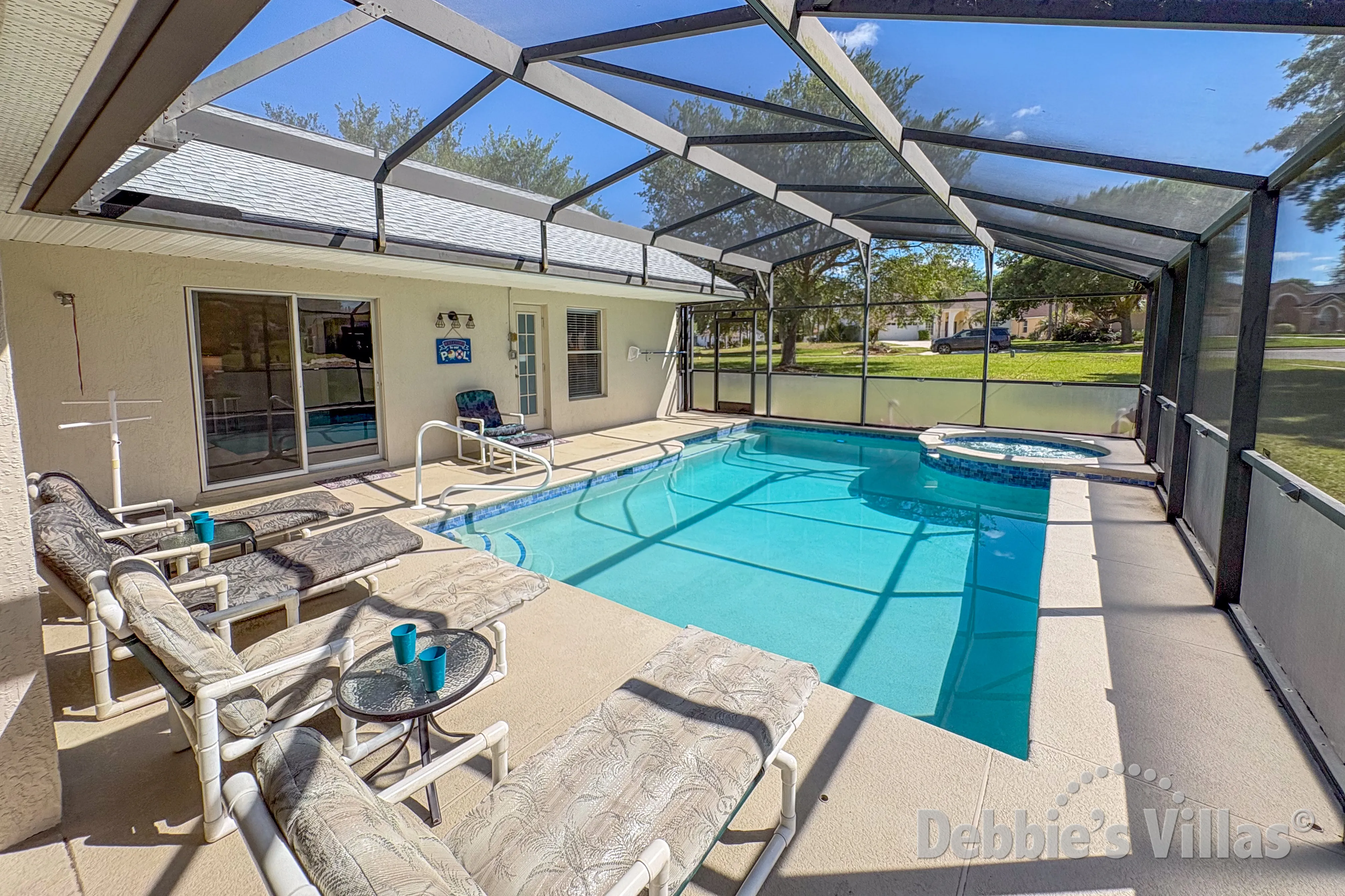 South-facing pool and spa at this vacation villa on Orange Tree in Clermont 