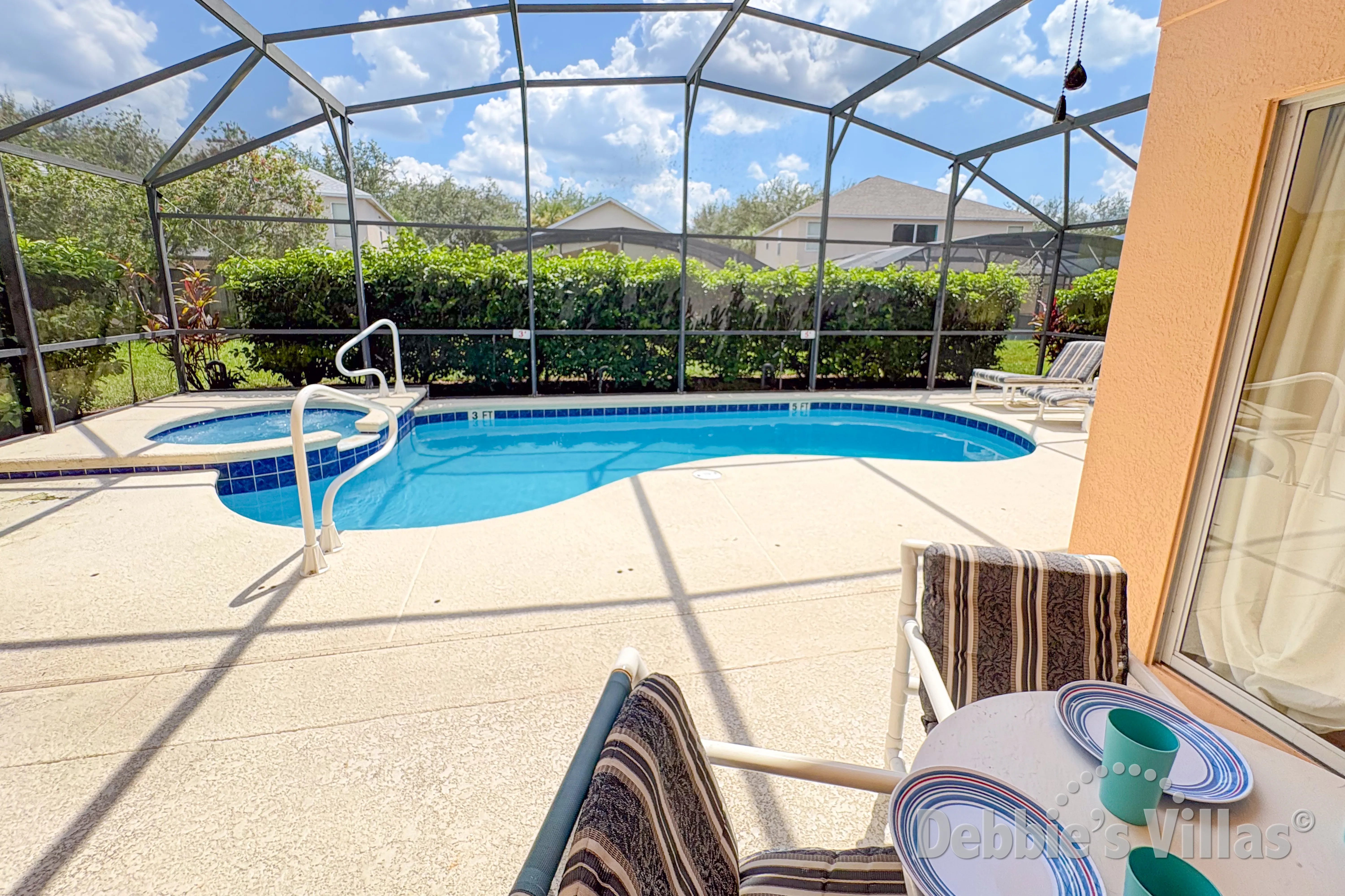 South-facing pool and spa at this vacation villa on Emerald Island in Kissimmee 