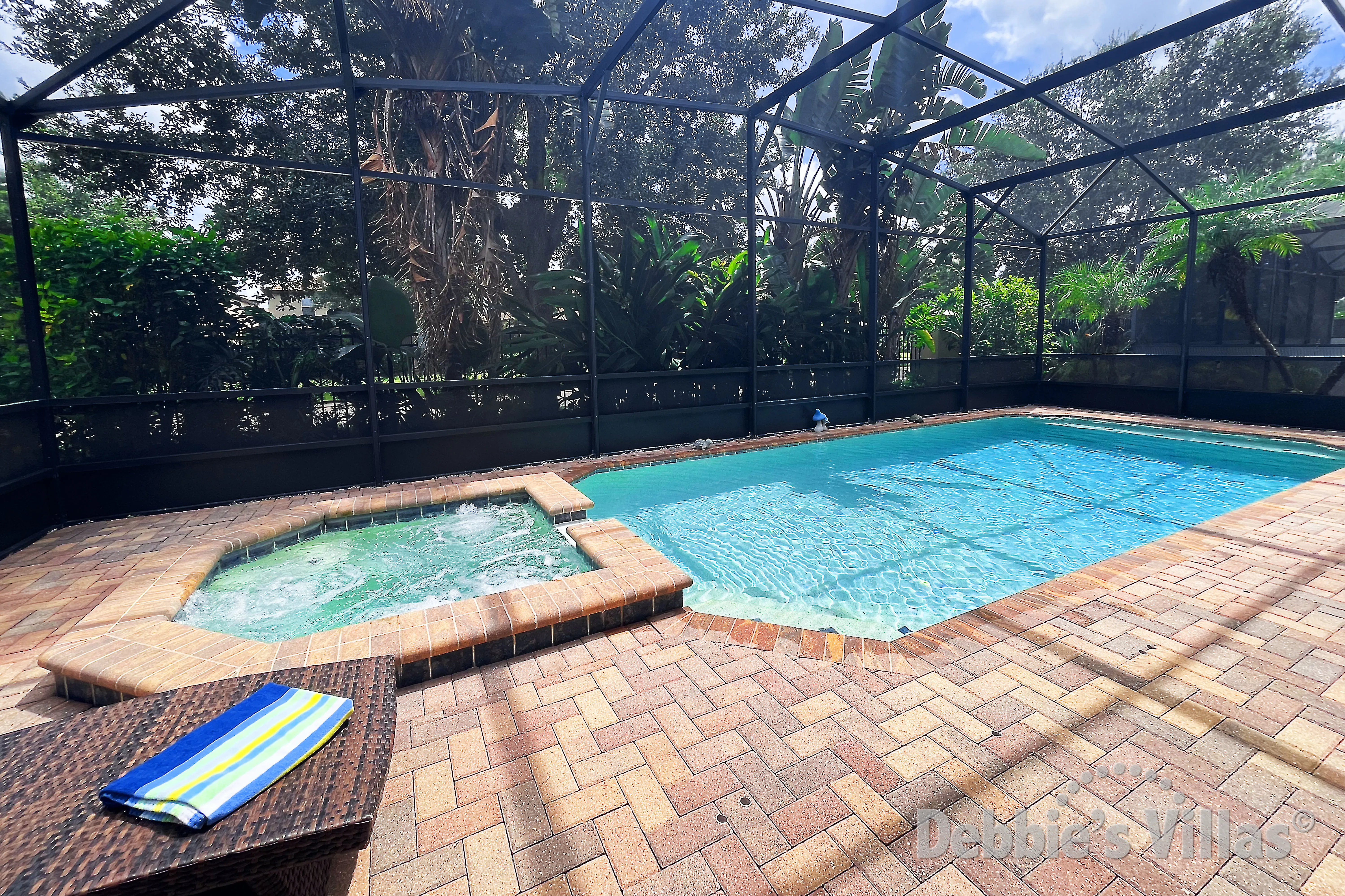 Southeast-facing pool and spa at this vacation villa on Windsor at Westside in Kissimmee