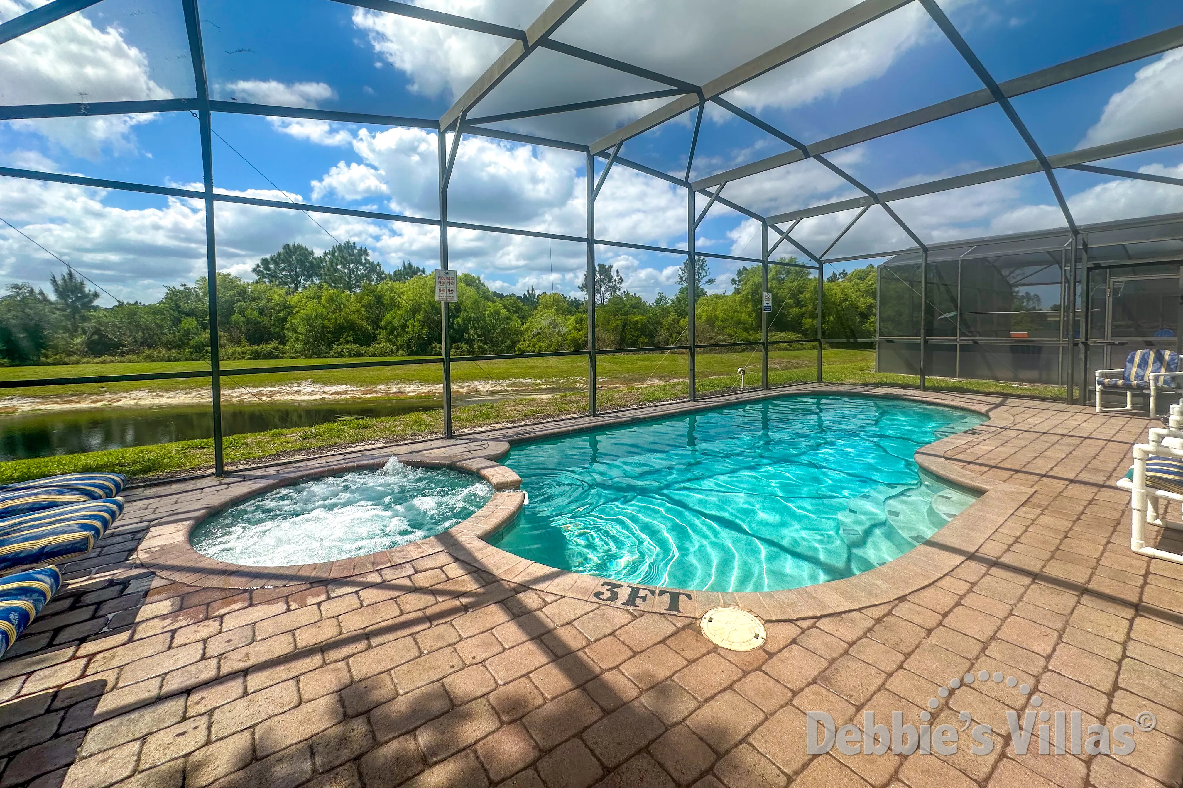 West-facing pool and spa at this vacation villa on High Grove in Clermont