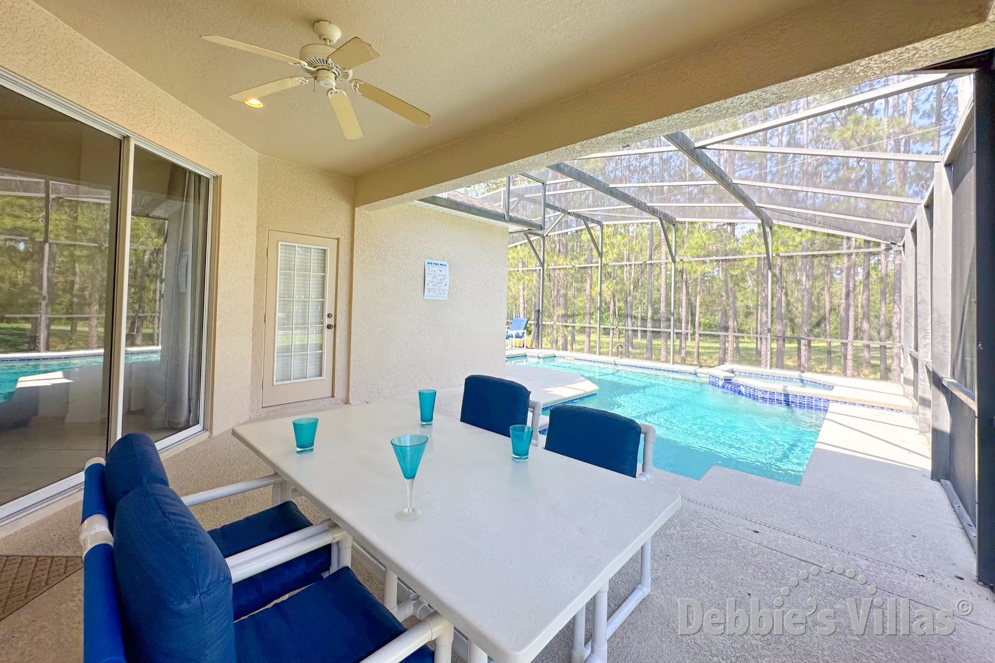 Enjoy alfresco dining beside the pool at this Davenport vacation villa