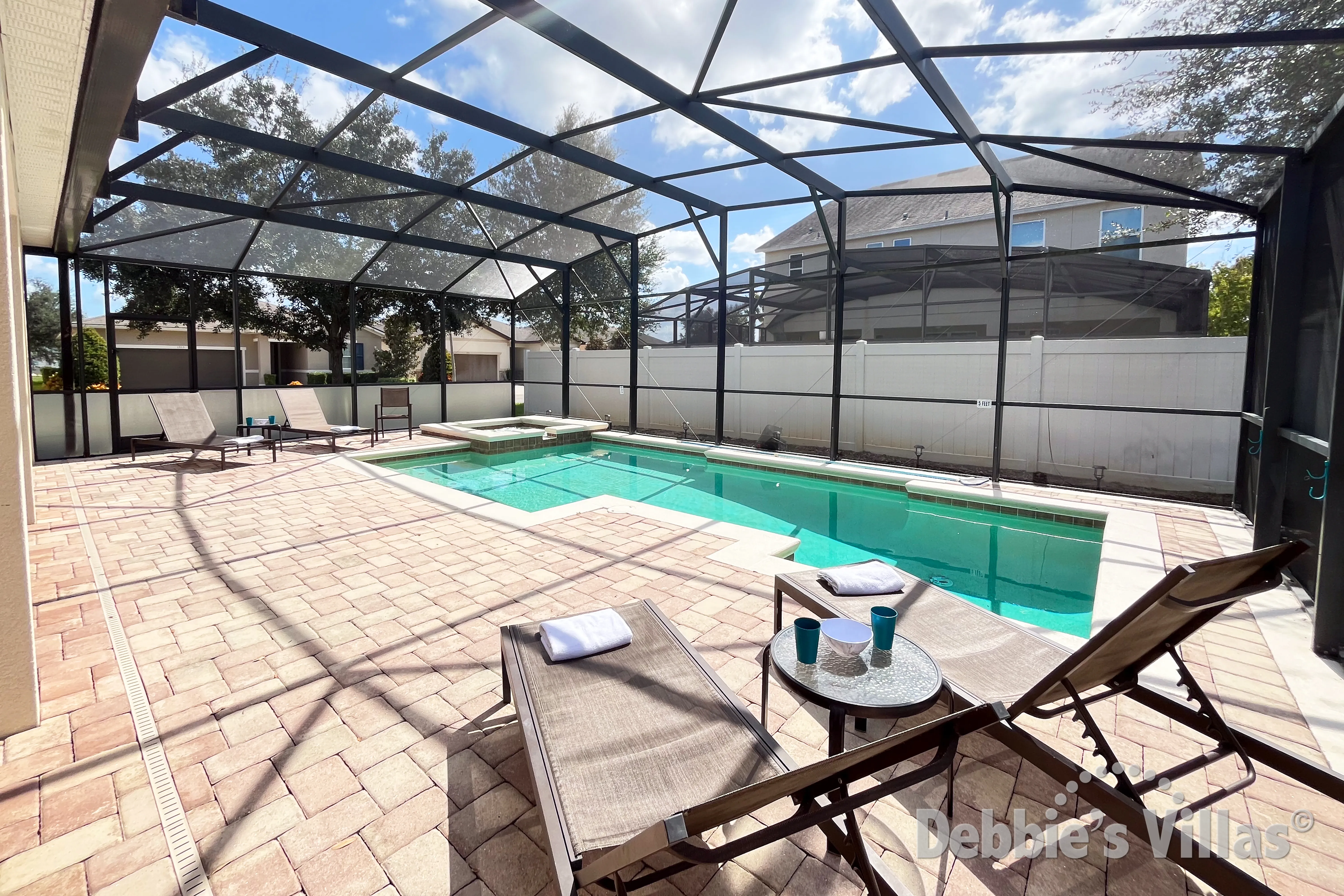 South-facing pool and spa at this vacation villa on West Haven - The Dales in Davenport