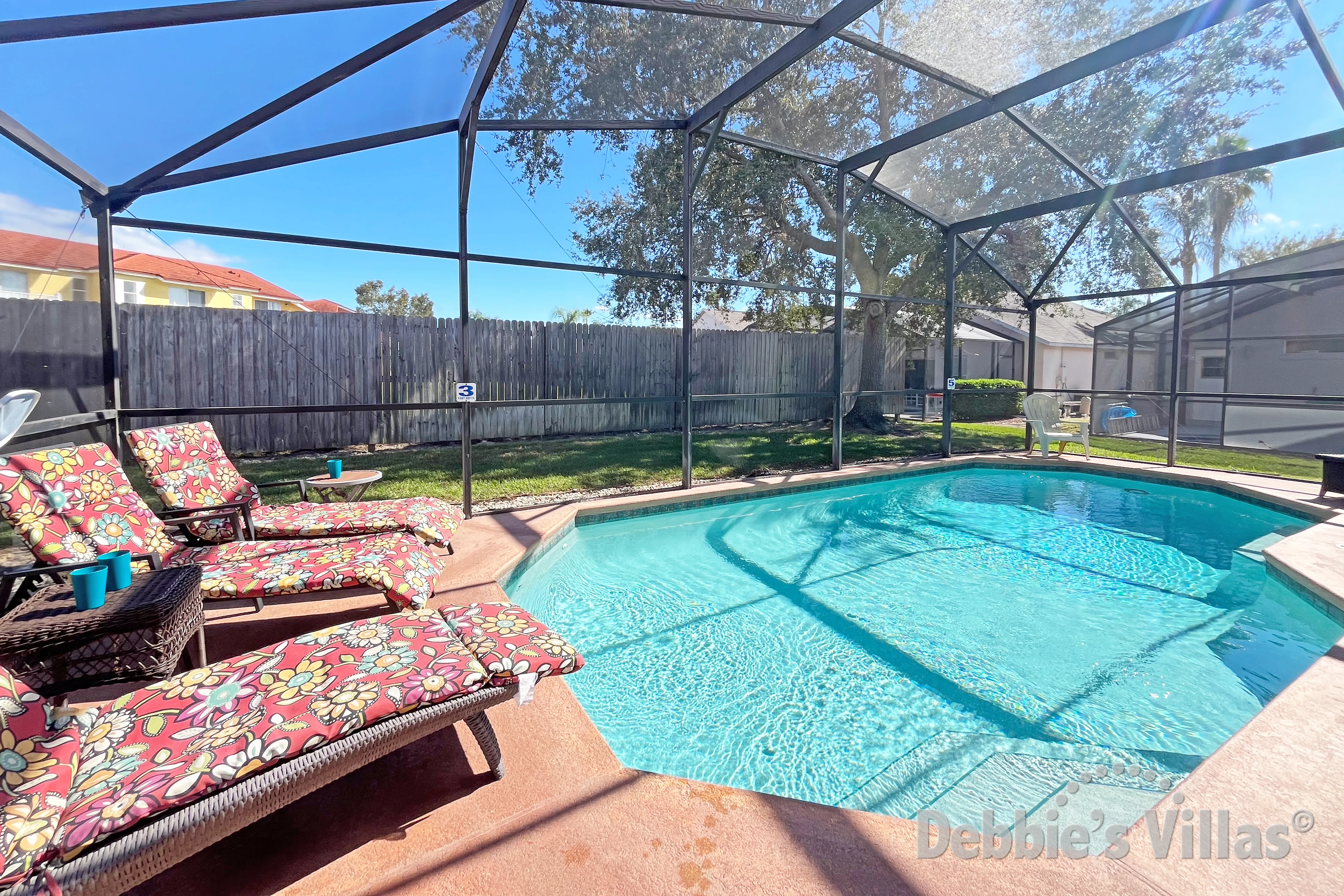 Sunny private pool at this vacation villa on Lake Berkley in Kissimmee
