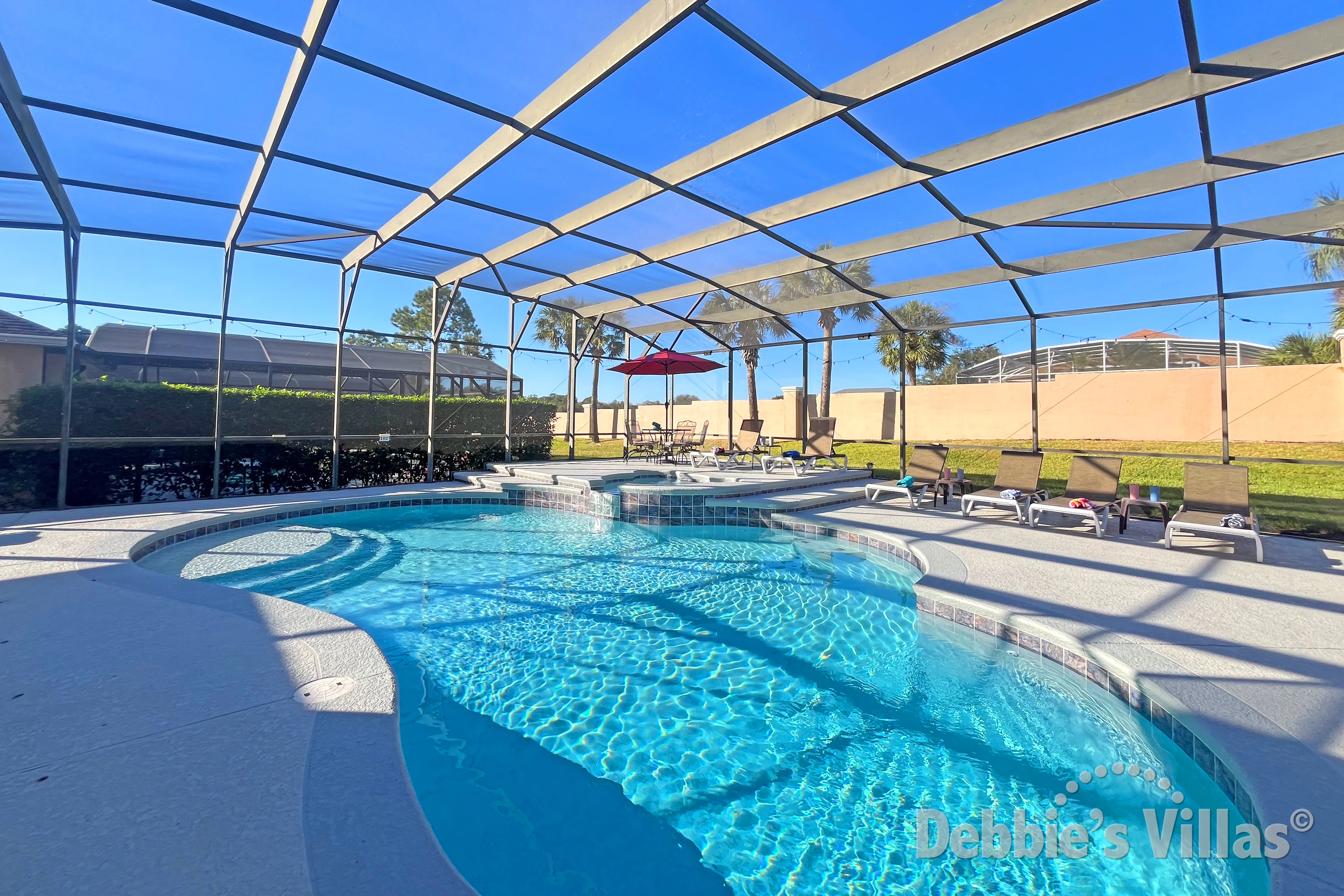 Large private pool deck at this vacation villa on Calabay Parc in Davenport
