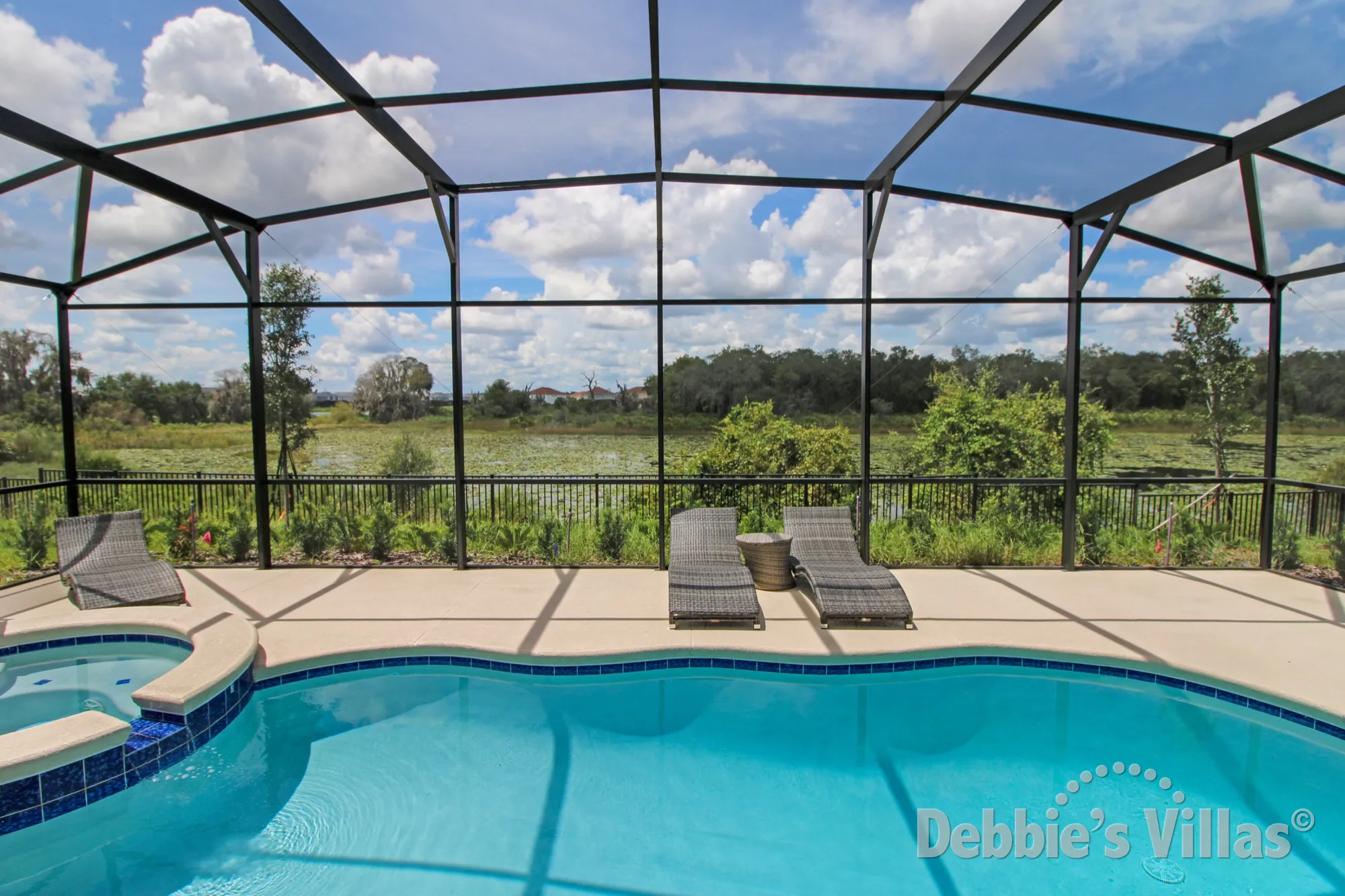 Solterra vacation villa with a lake view from the west-facing private pool area