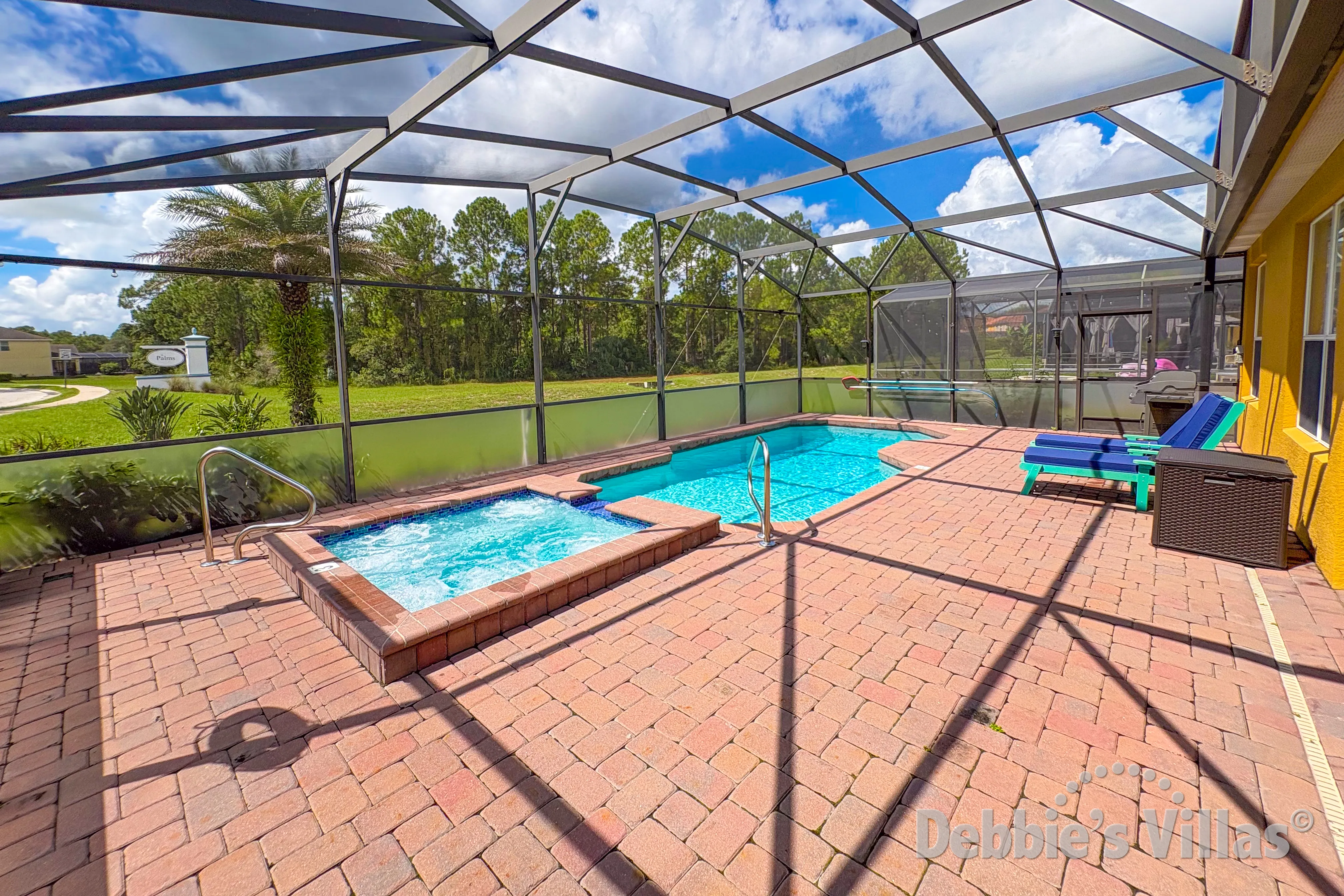 South-facing pool and spa at this vacation villa on Watersong in Davenport 