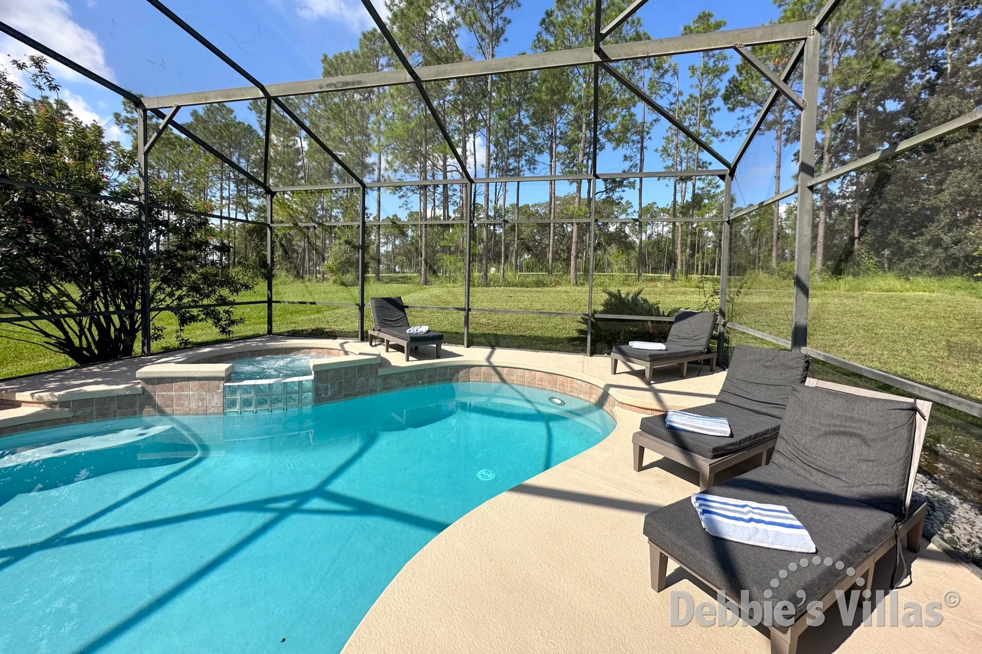 Stunning west-facing pool deck with golf course views at this Highlands Reserve vacation villa