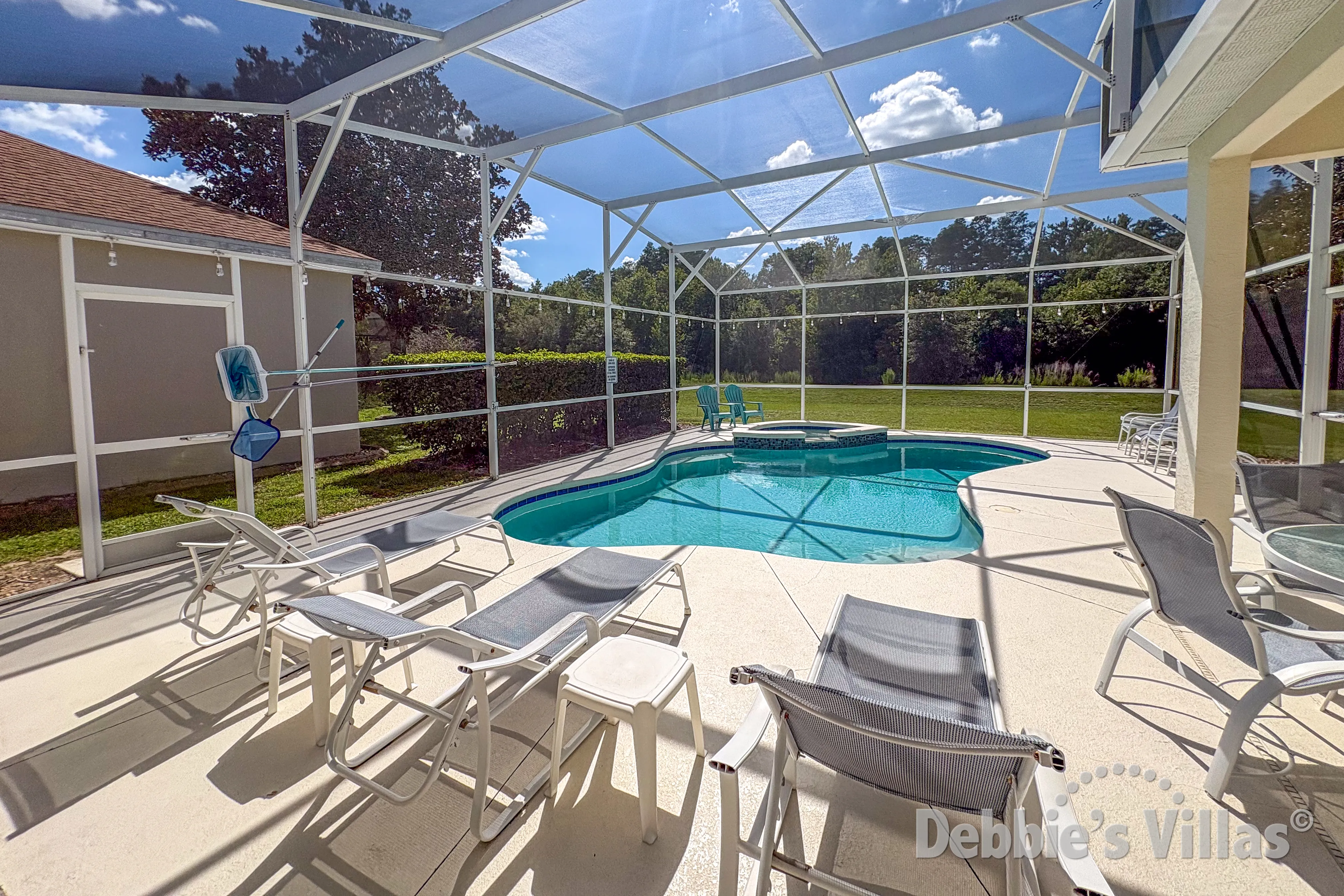 West-facing pool and spa at this vacation villa on Highlands Reserve in Davenport 