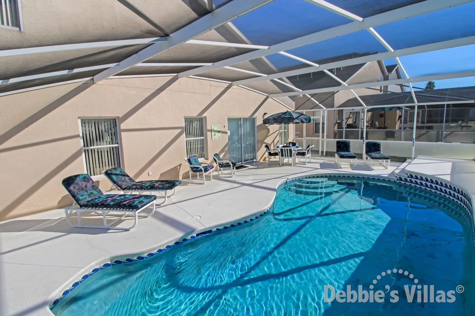 Lots of space on the private pool of this Hampton Lakes villa in Davenport