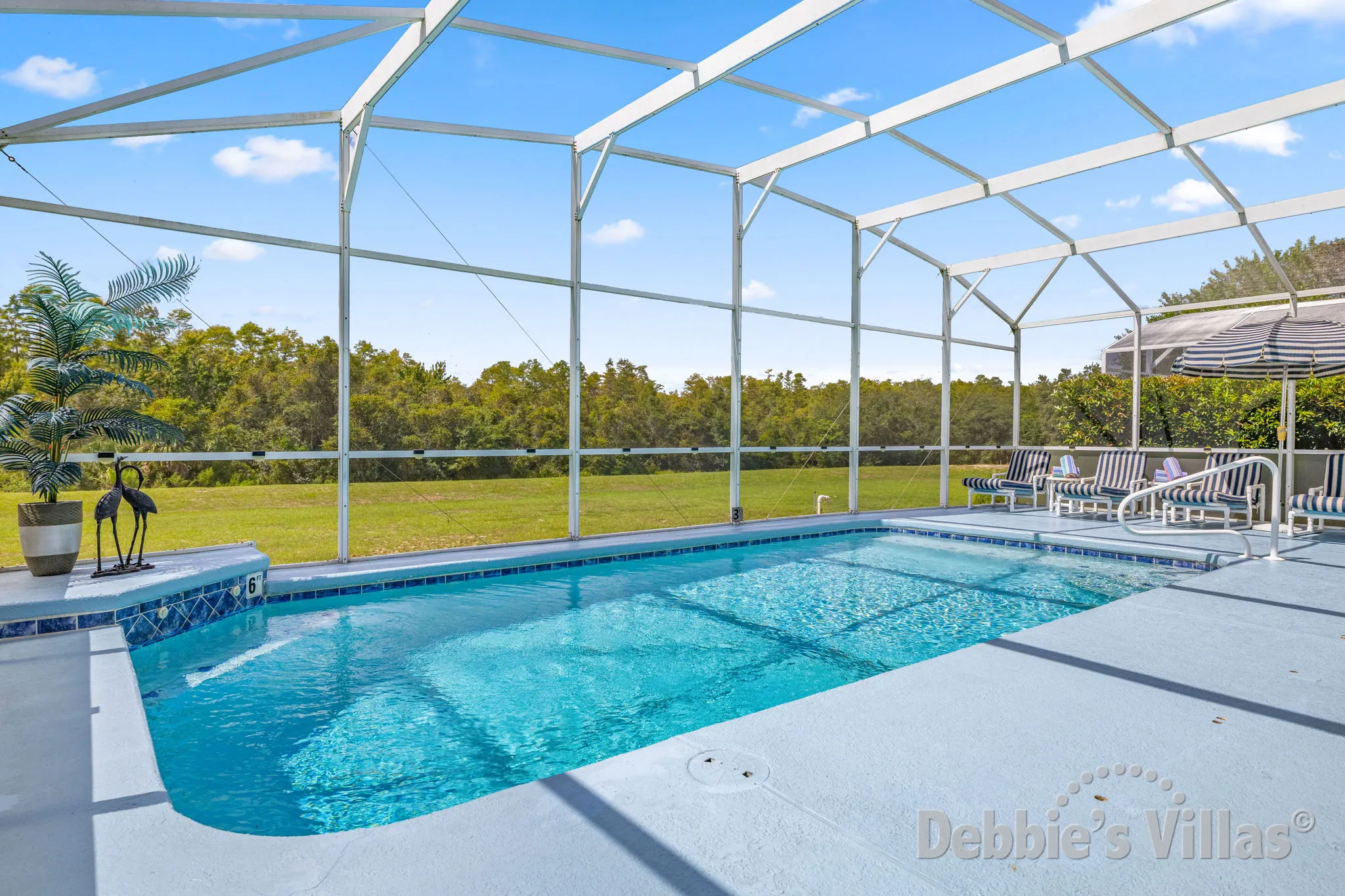 Southwest-facing pool at this vacation villa on Highlands Reserve in Davenport 