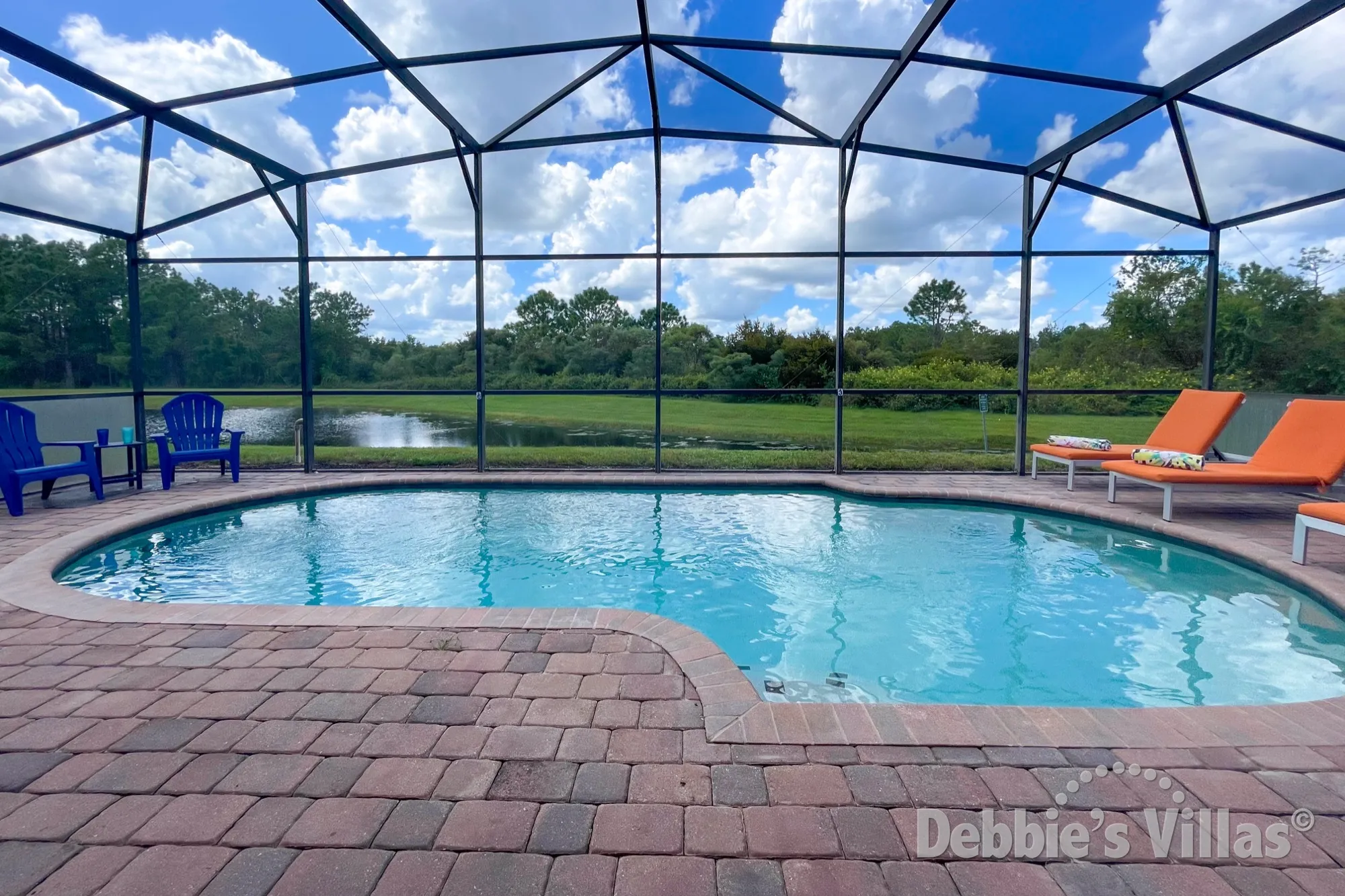 Take a peaceful morning swim and admire the lake view at this Clermont vacation villa
