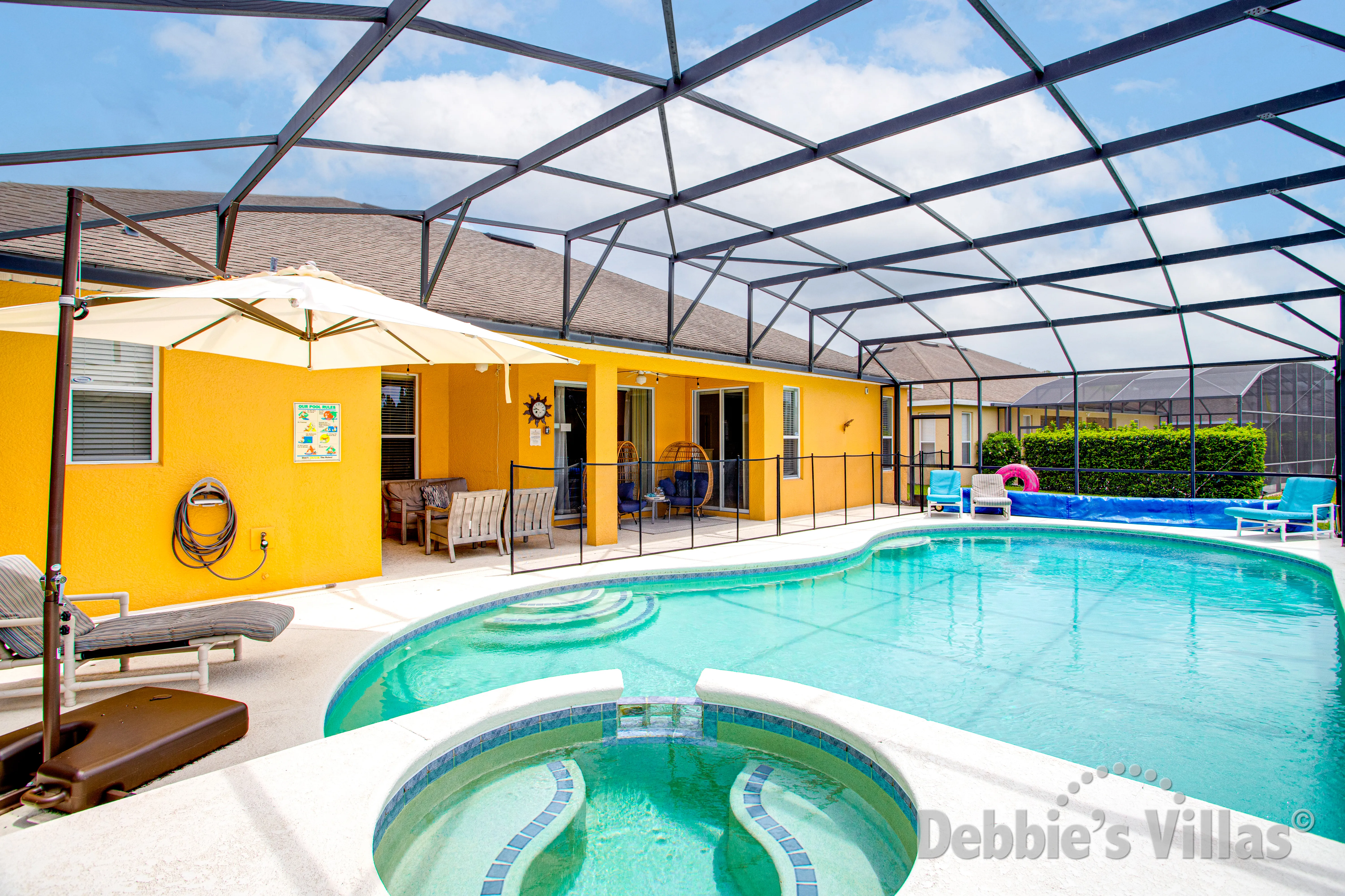 Peaceful south-facing pool deck at this Watersong vacation villa
