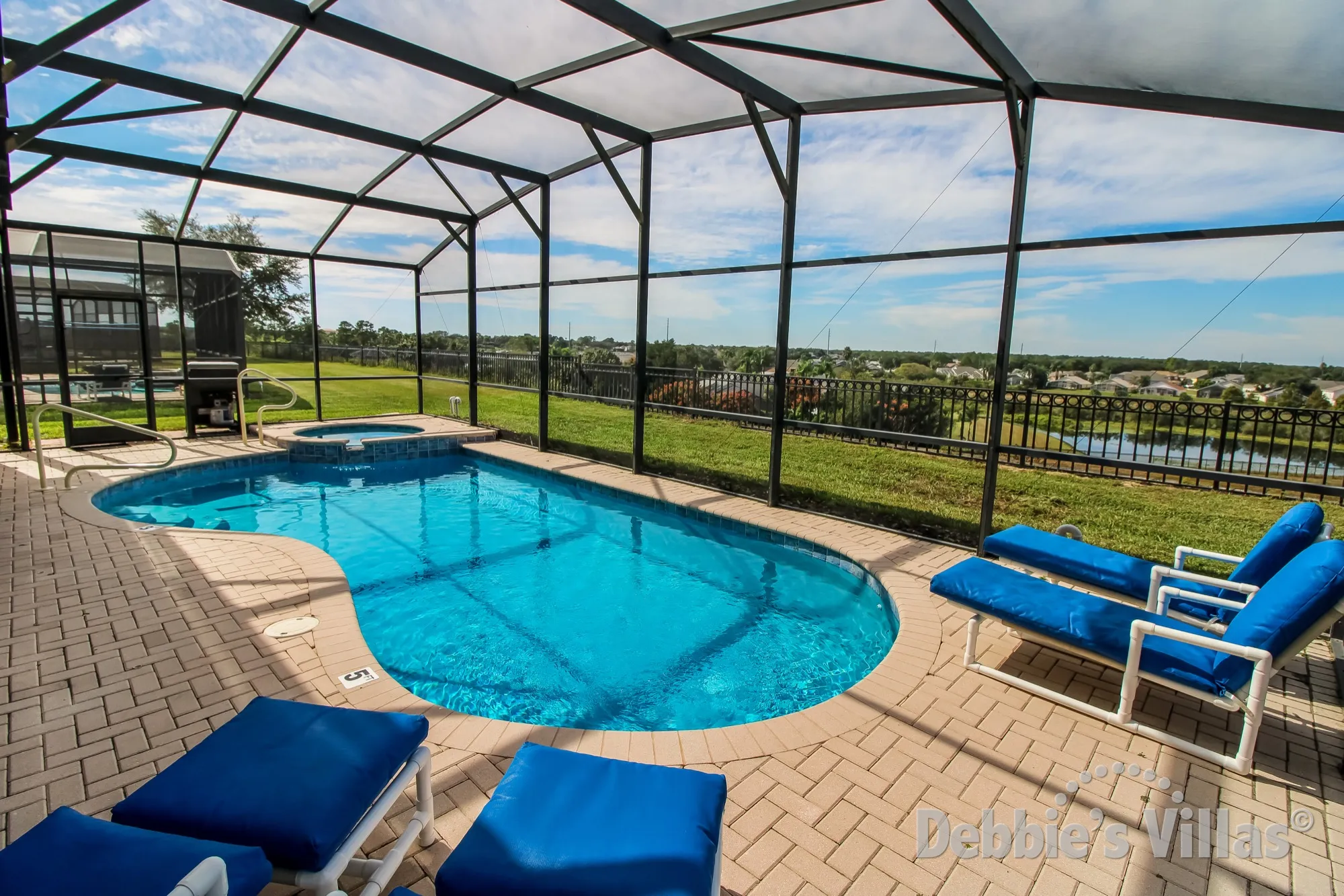 Windsor Hills villa with a lake view from the west-facing pool and spa