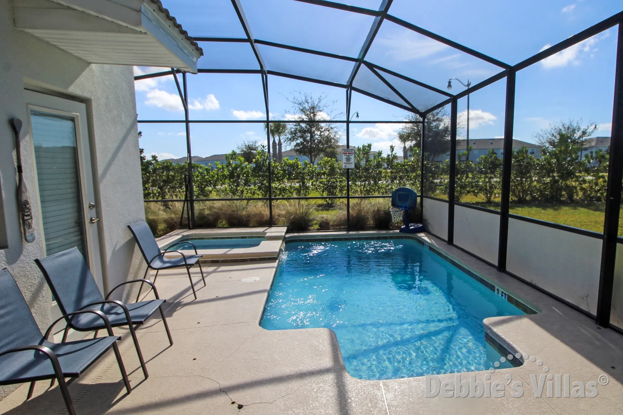 Southeast-facing private pool and spa at this Storey Lake vacation villa in Kissimmee