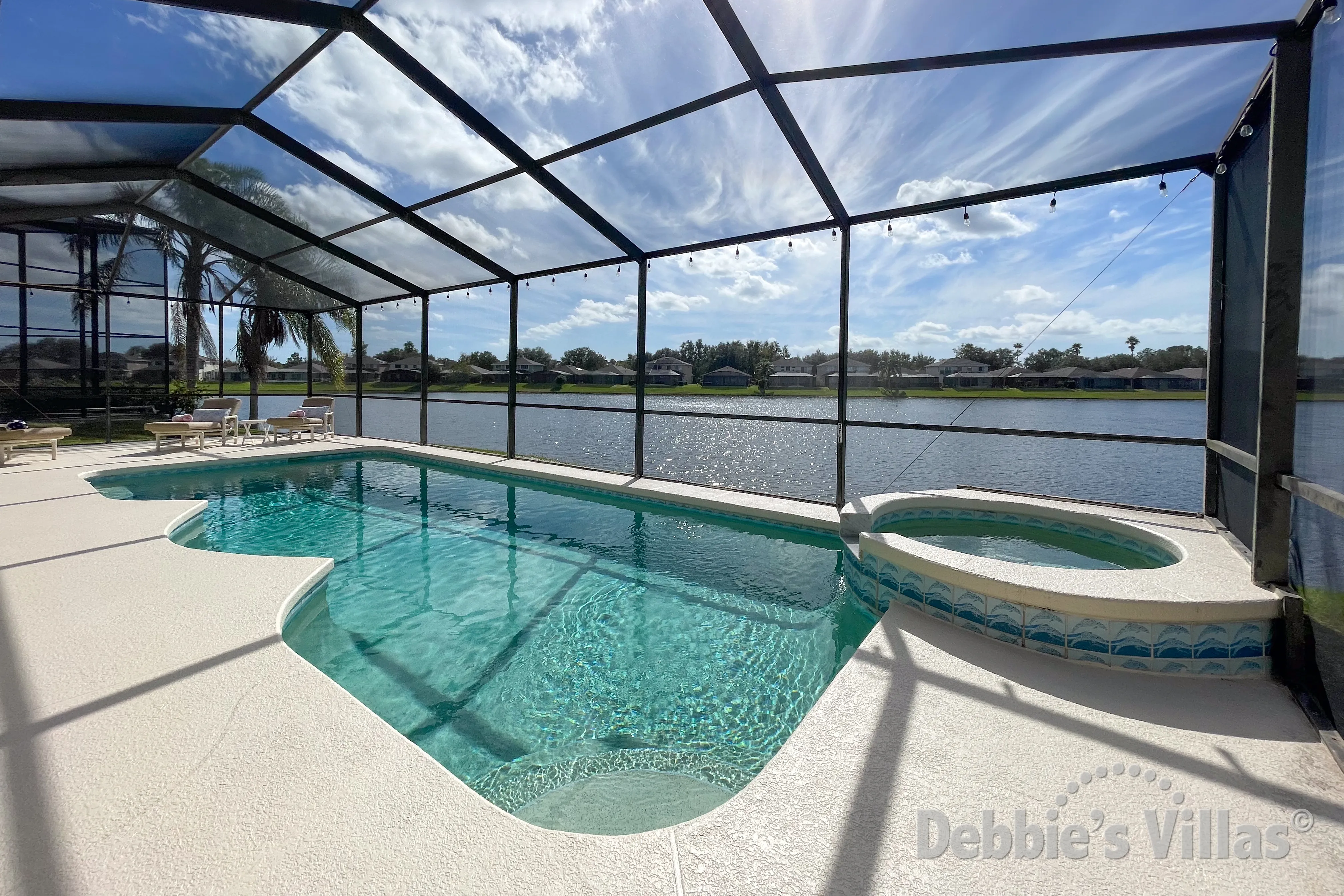Southwest-facing pool and spa at this vacation villa on Sunset Lakes in Kissimmee