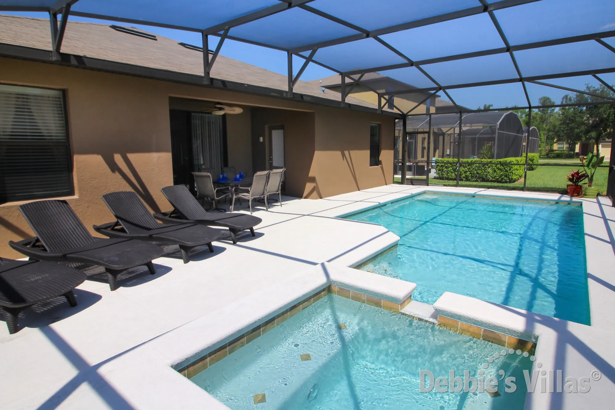 South-facing pool and spa at this vacation villa on Cypress Pointe in Davenport