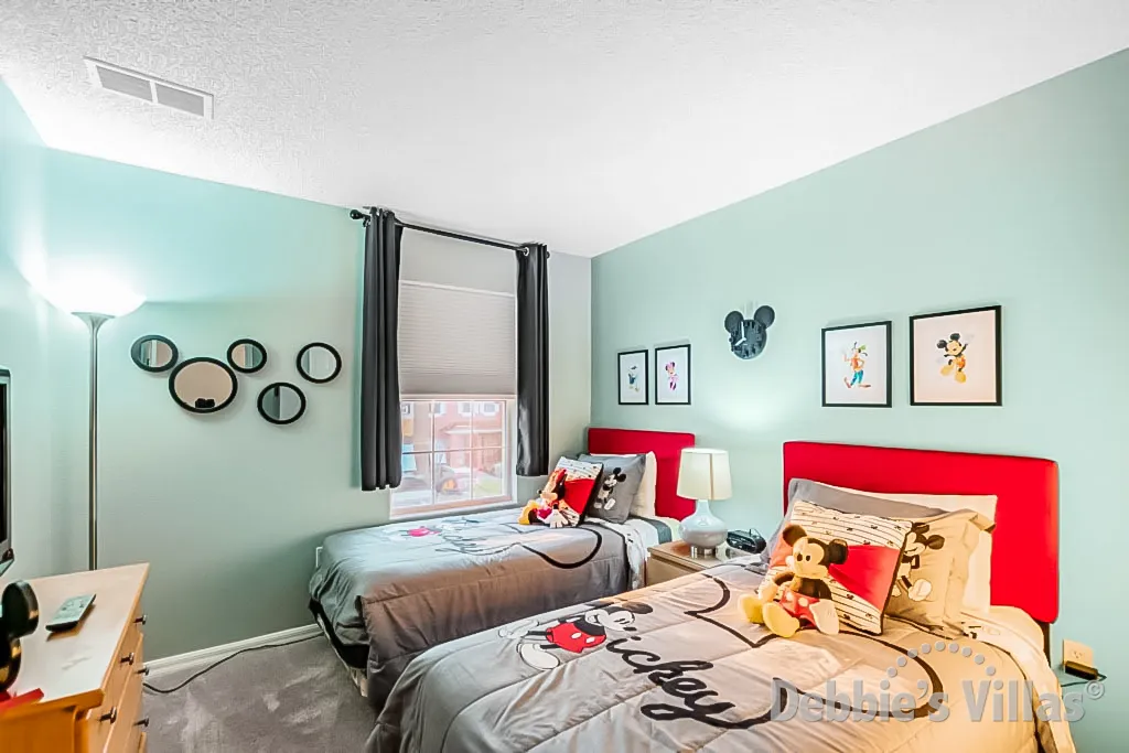 Twin beds in the Disney-themed Bedroom 3