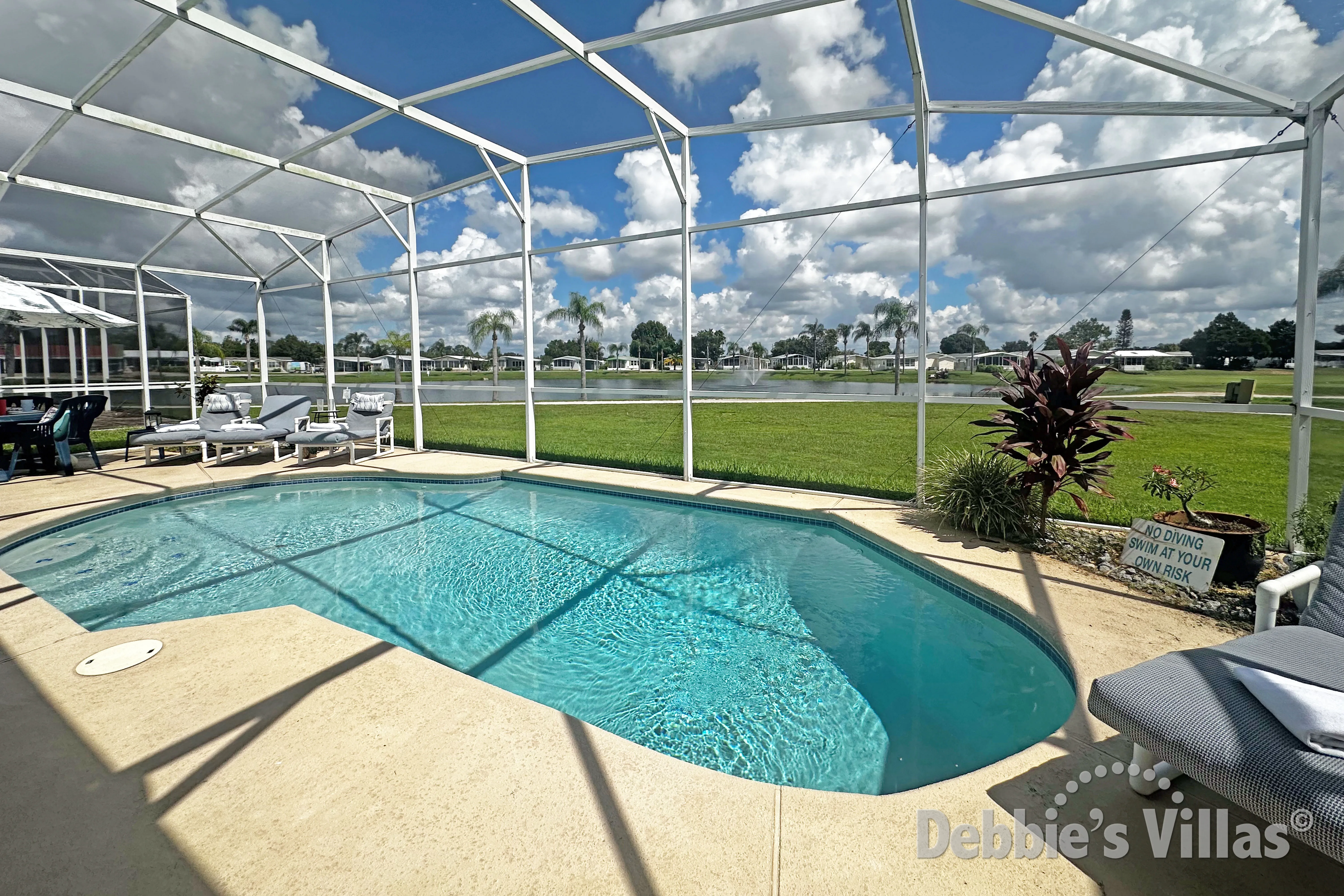 Sunny private pool with lake view at Davenport vacation villa 