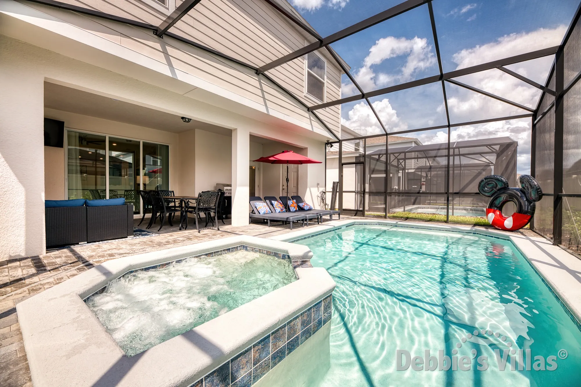 Sun-drenched south-facing pool deck at this Kissimmee vacation villa