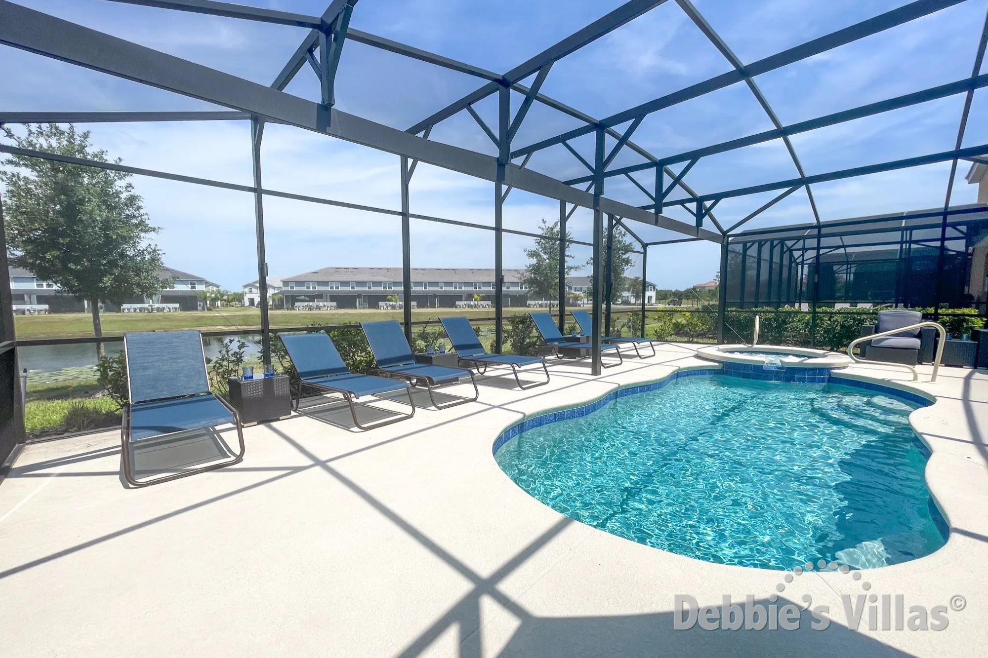 Stunning pool deck with lake view at this Solterra vacation villa