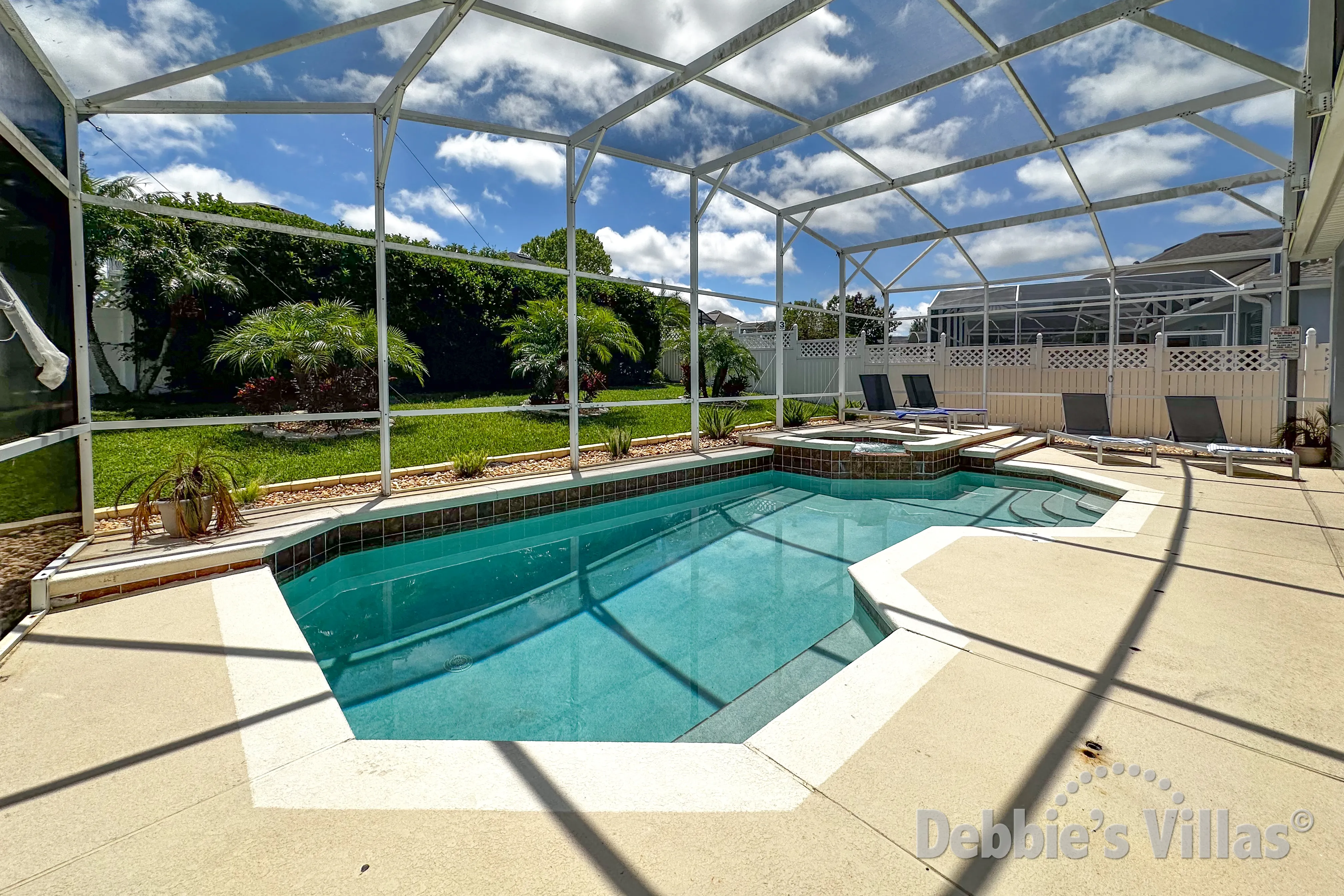 Southeast-facing pool and spa at this vacation villa on Highlands Reserve in Davenport