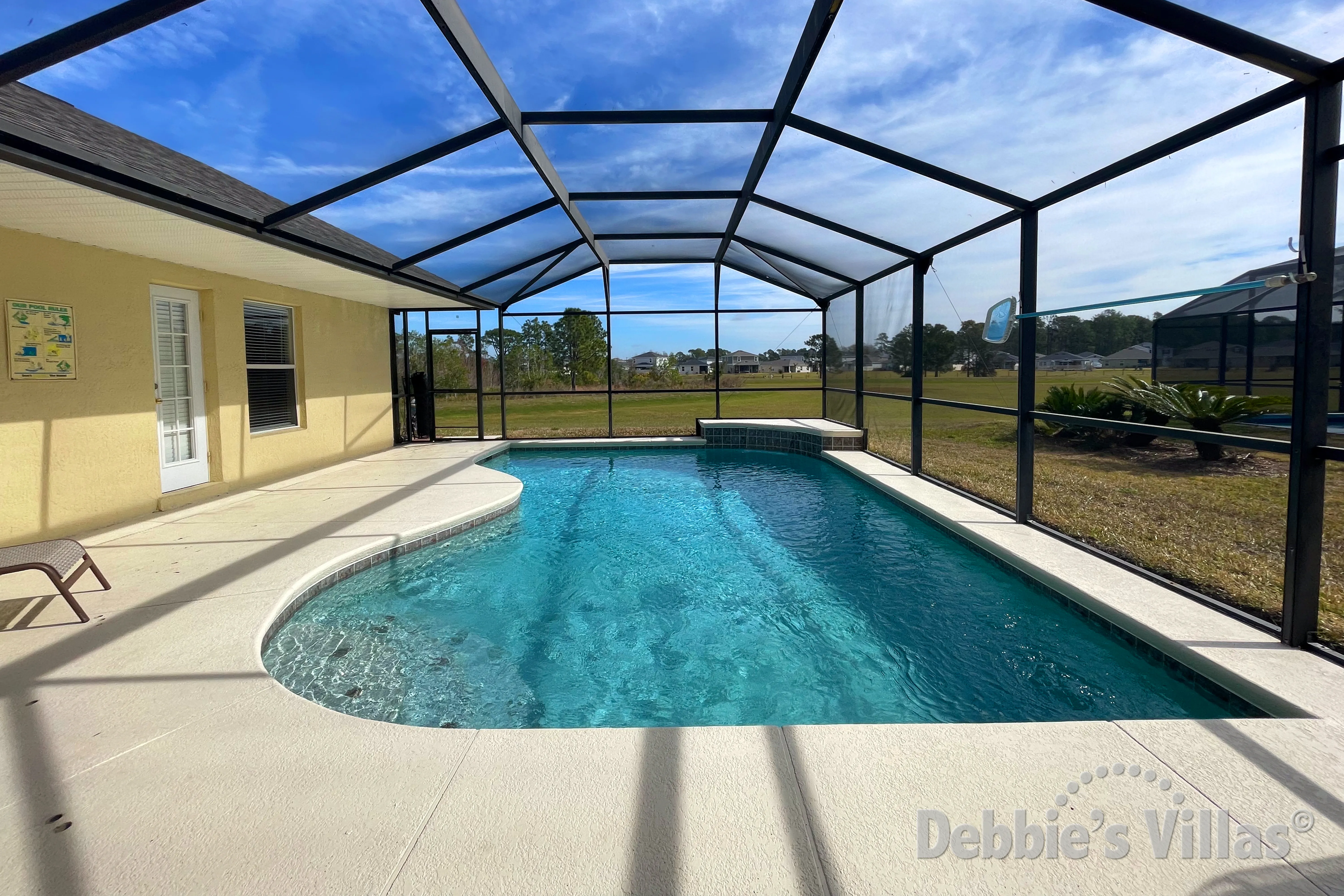 South and east-facing pool at this vacation villa on Orange Tree in Clermont