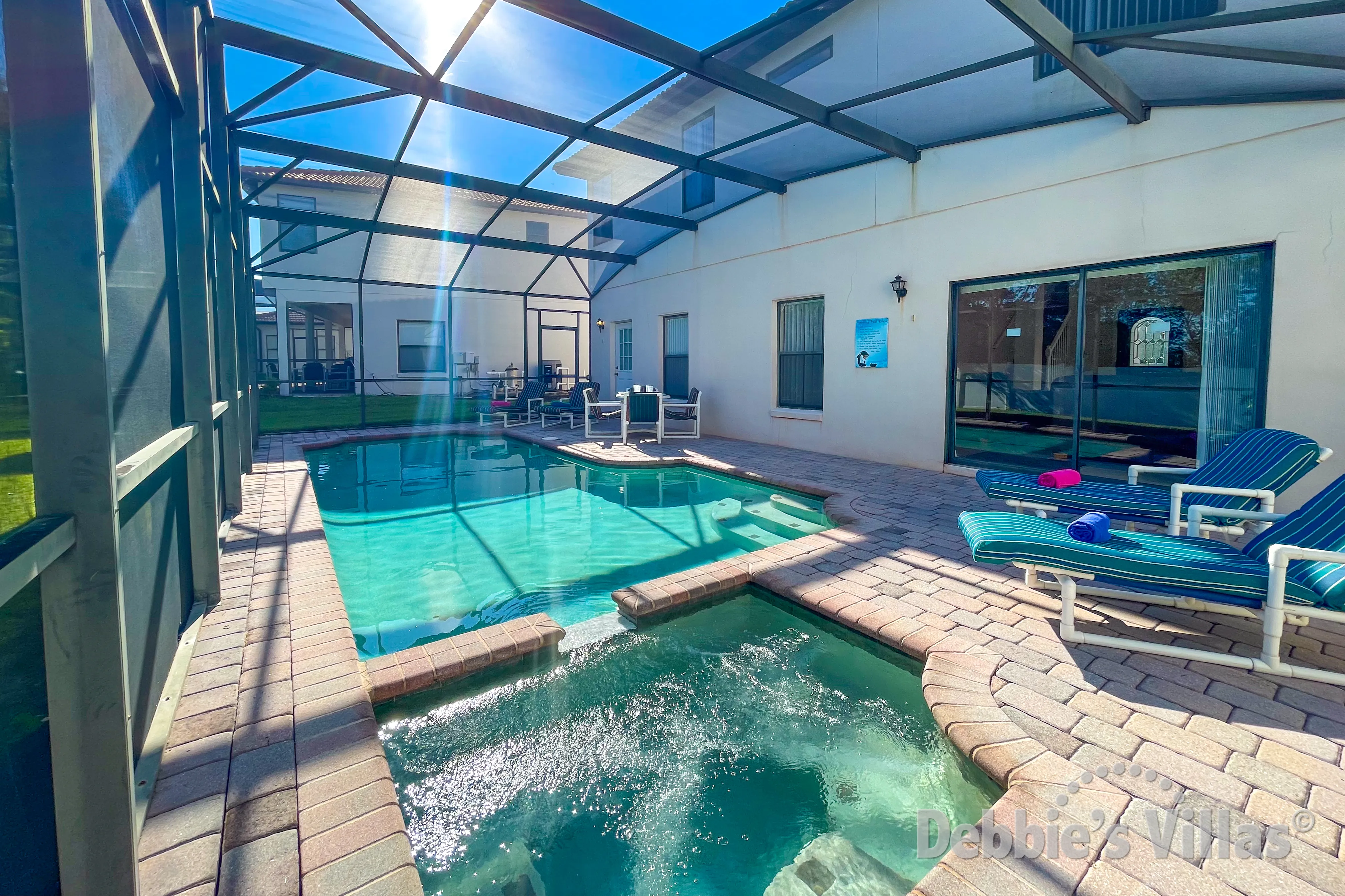 Enjoy bubbles in the spa and in your glass at this Clermont vacation villa