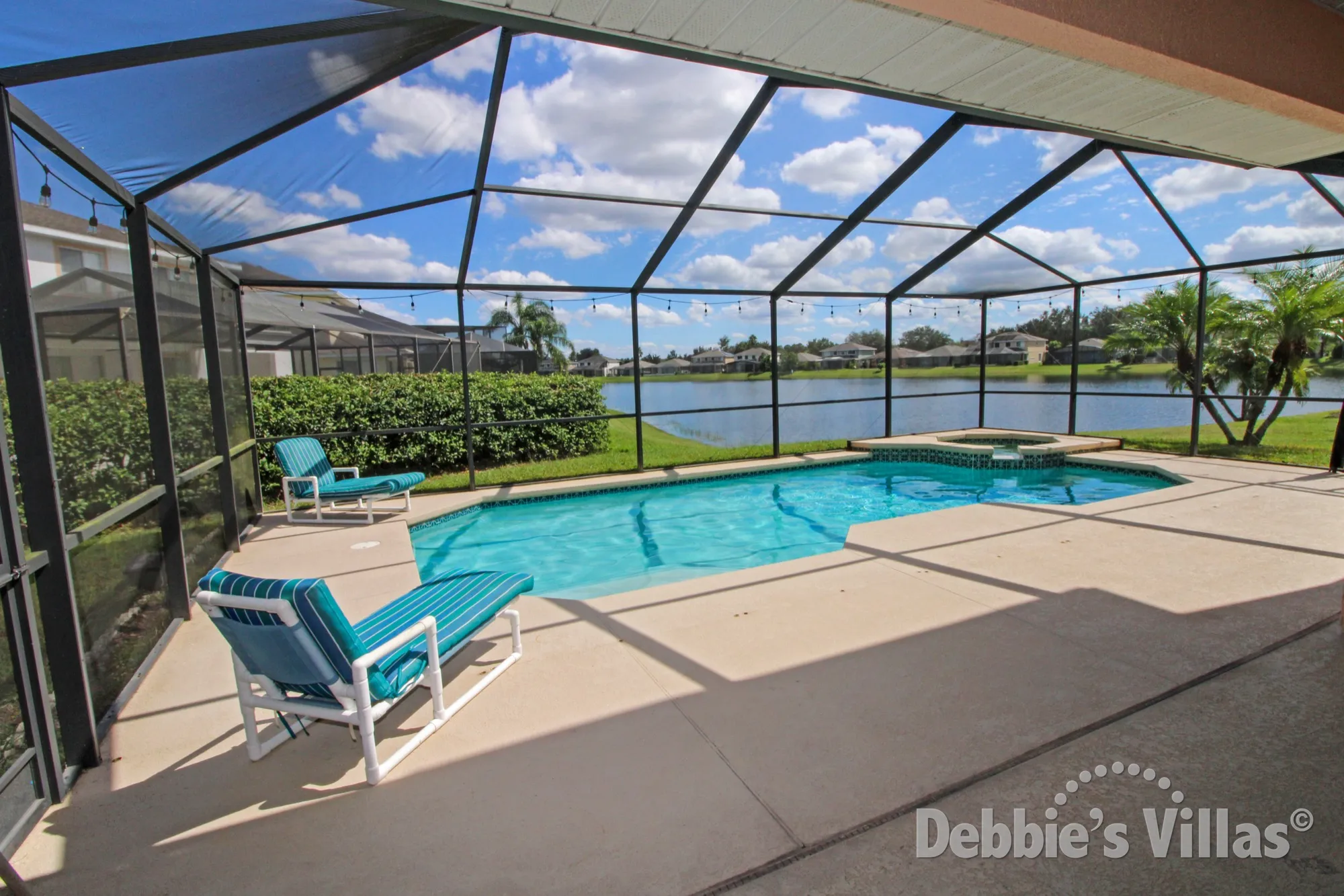 Kissimmee villa with a lake view from the private pool