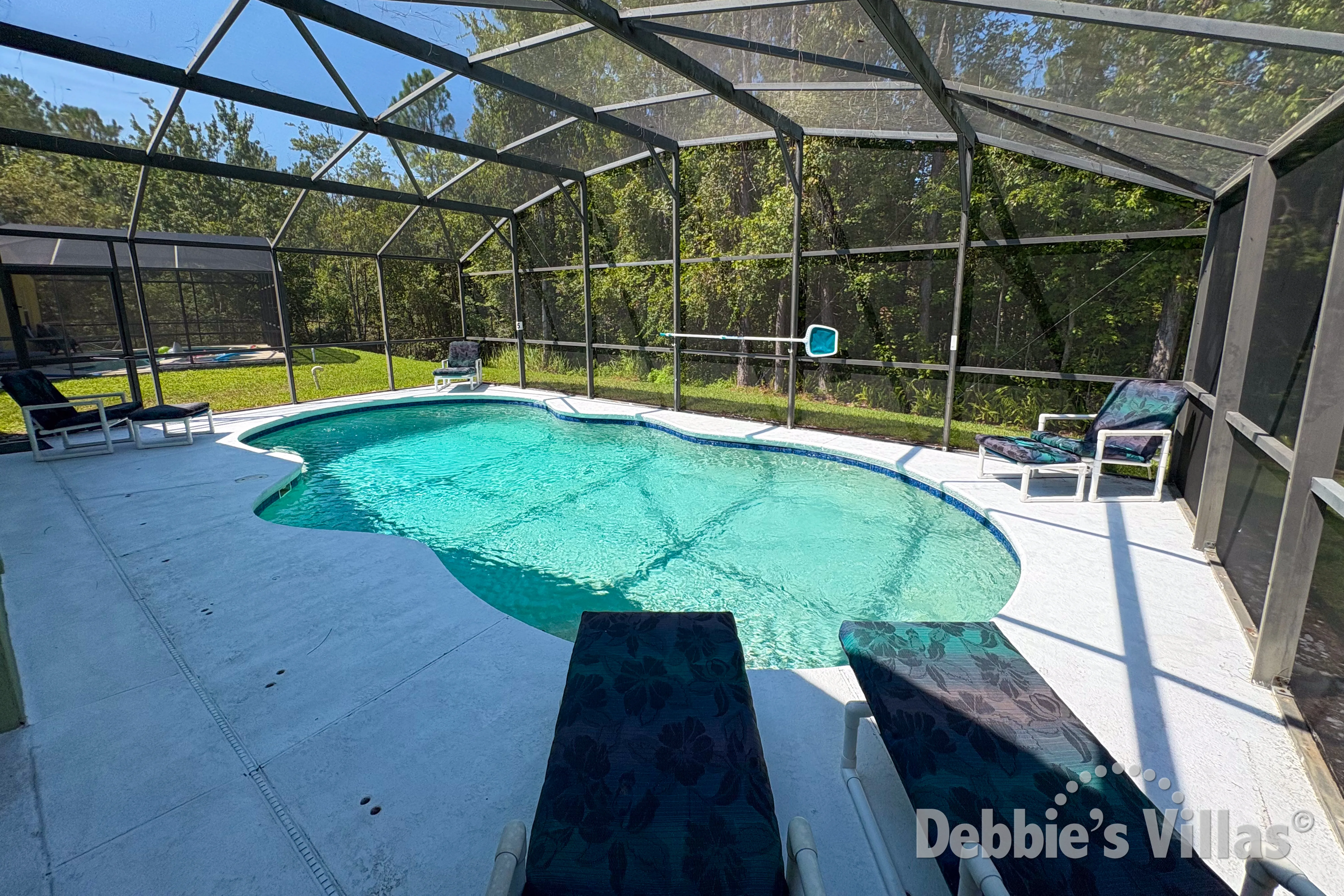 Southwest-facing pool at this vacation villa on Sandy Ridge in Davenport 
