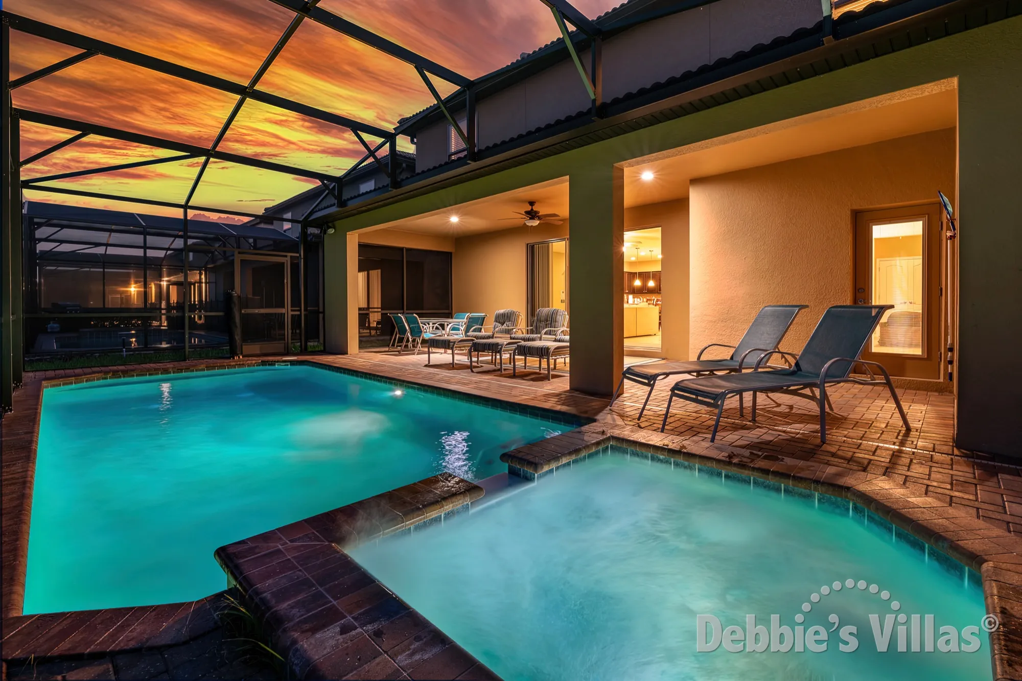 Relax by the pool and spa at this Kissimmee vacation villa