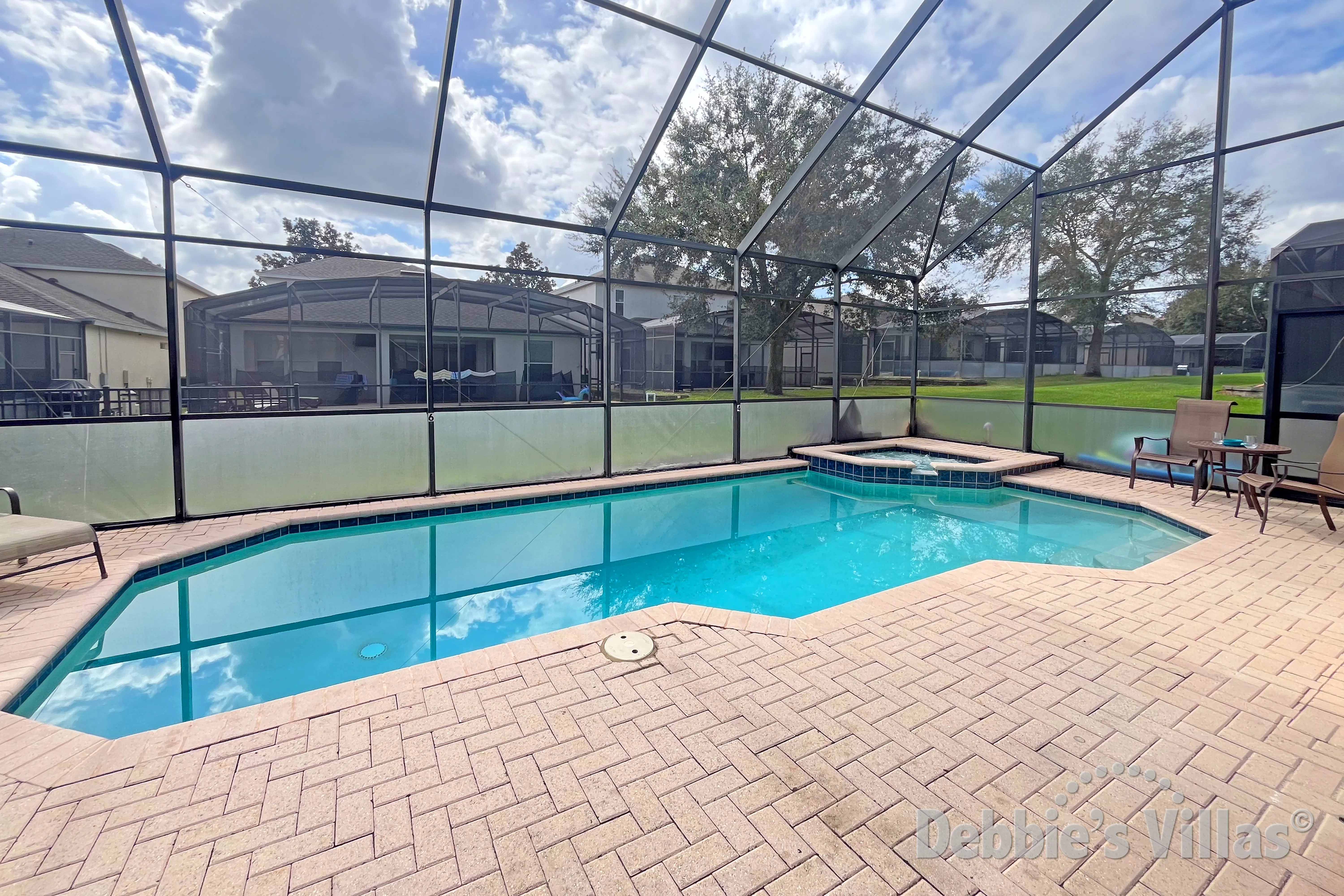 South-facing pool and spa at this vacation villa on Windsor Hills in Kissimmee