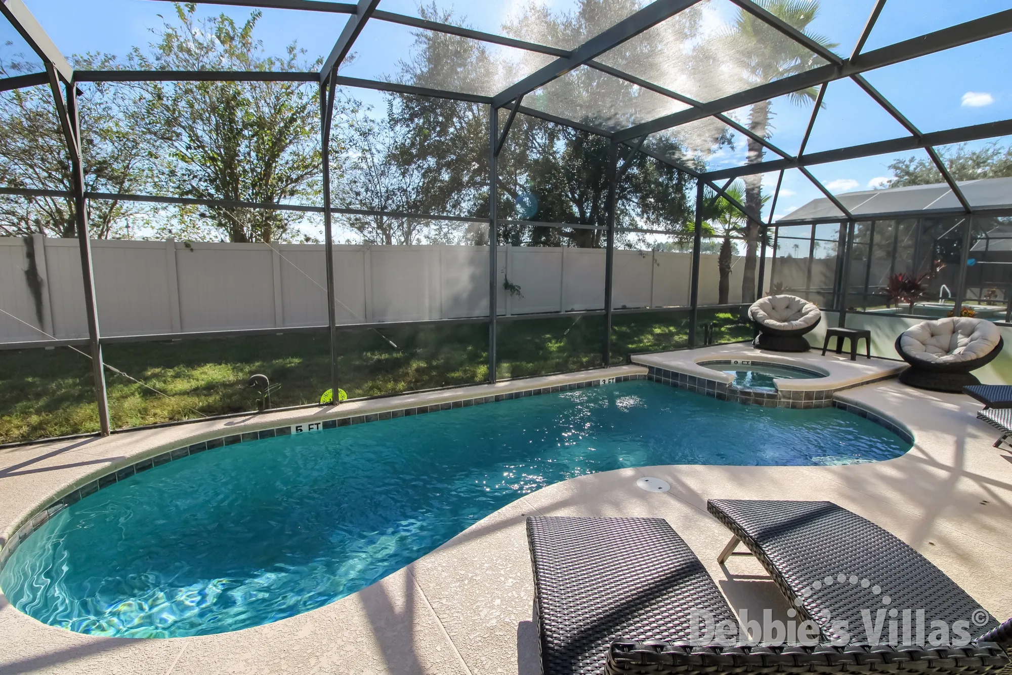South-facing pool and spa at this villa on Solana in Davenport