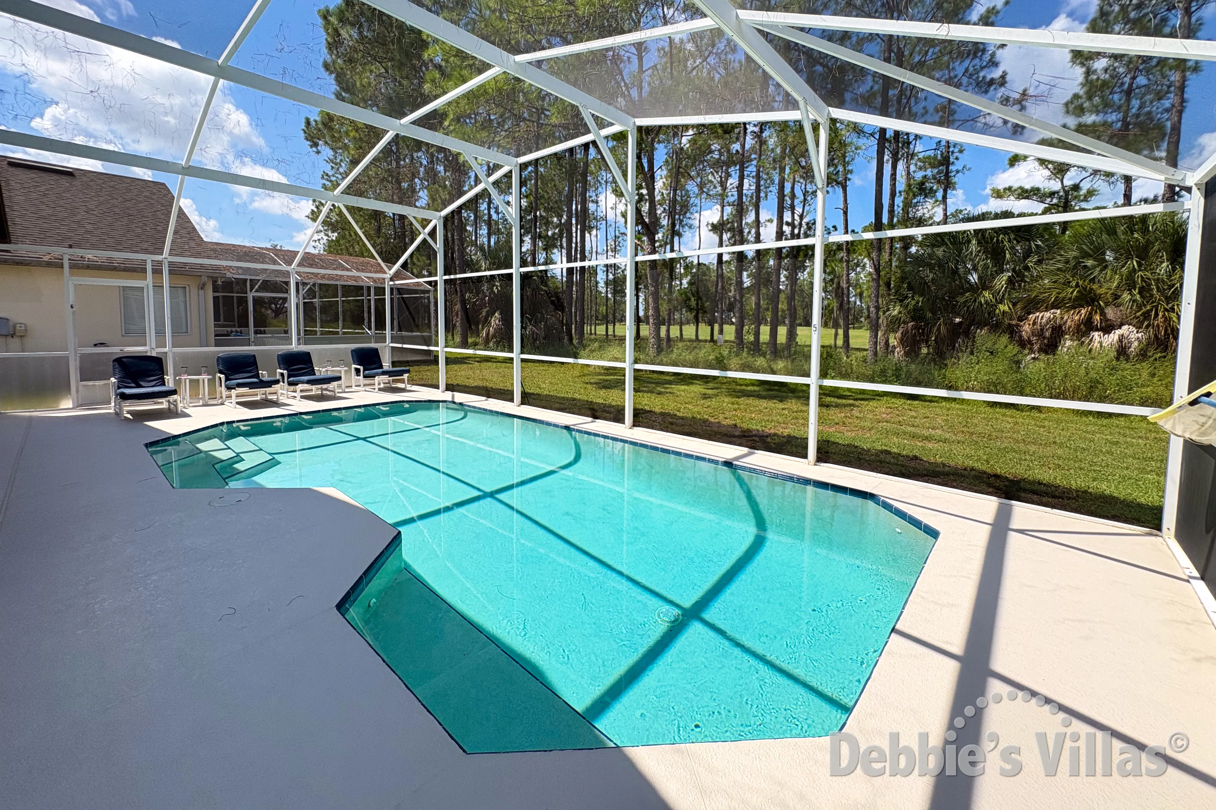 West-facing pool at this vacation villa on Highlands Reserve in Davenport 