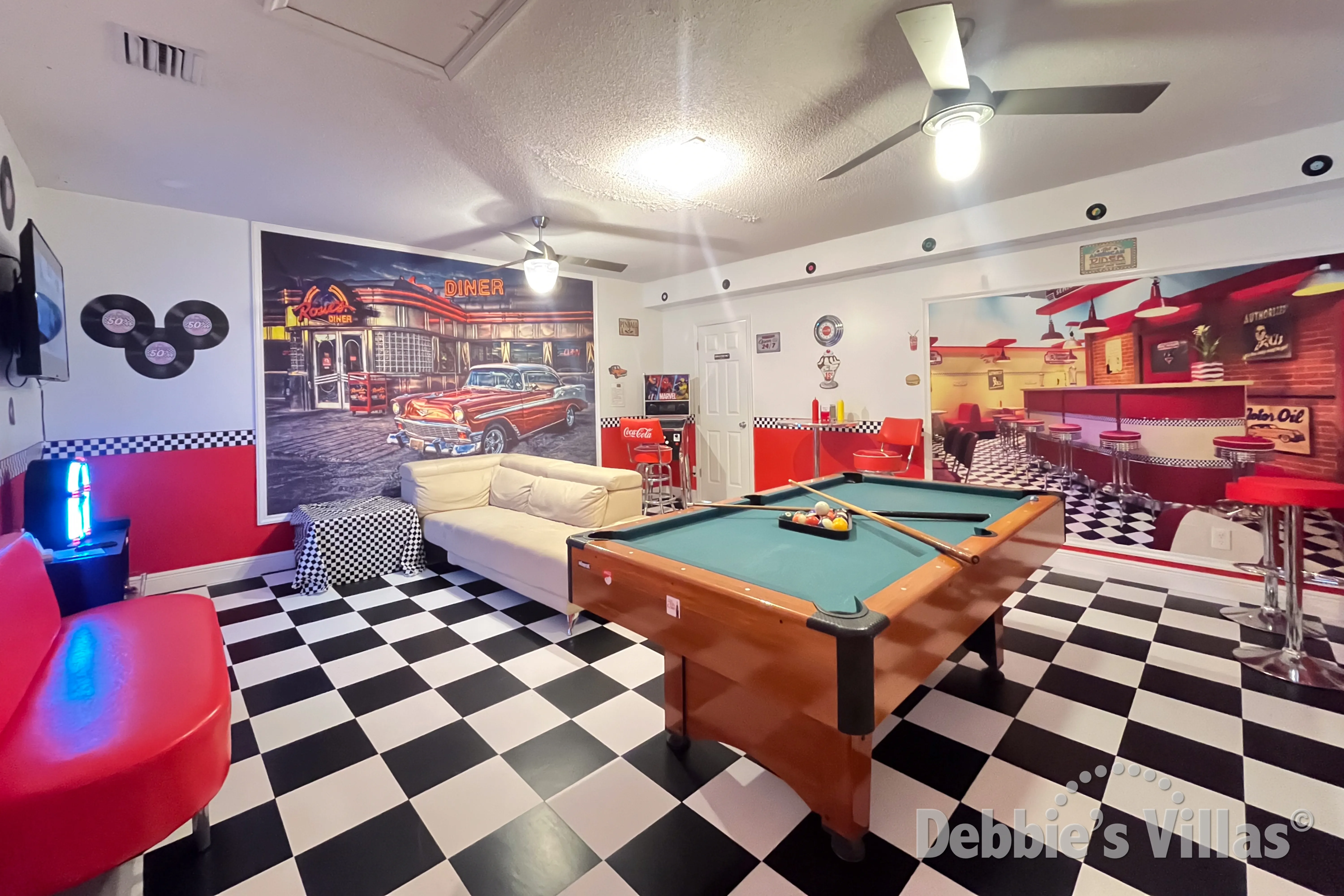 Practice your trick shots on the pool table in the games room at this Kissimmee vacation villa