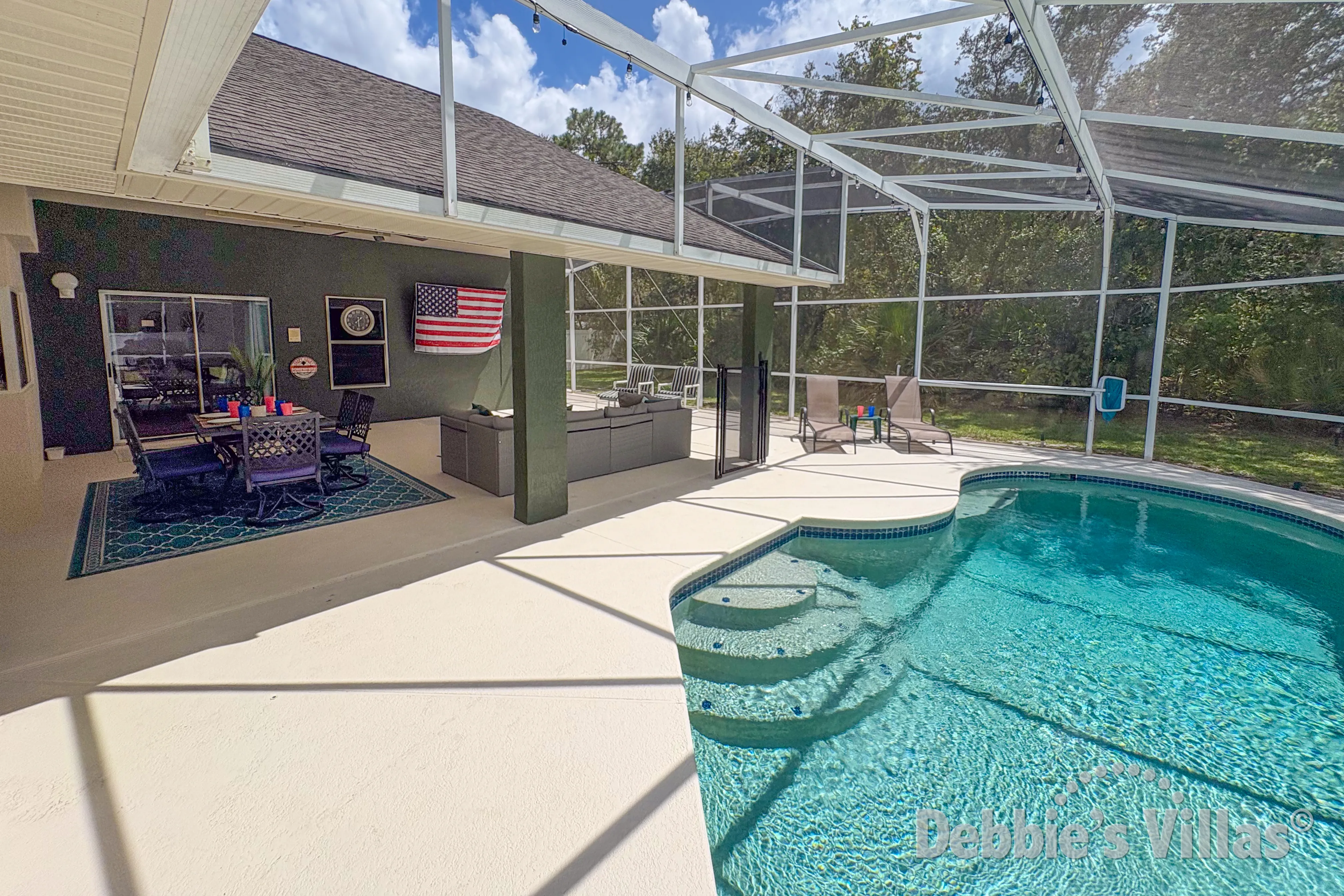 Easy access steps into the pool at this Orlando vacation villa 