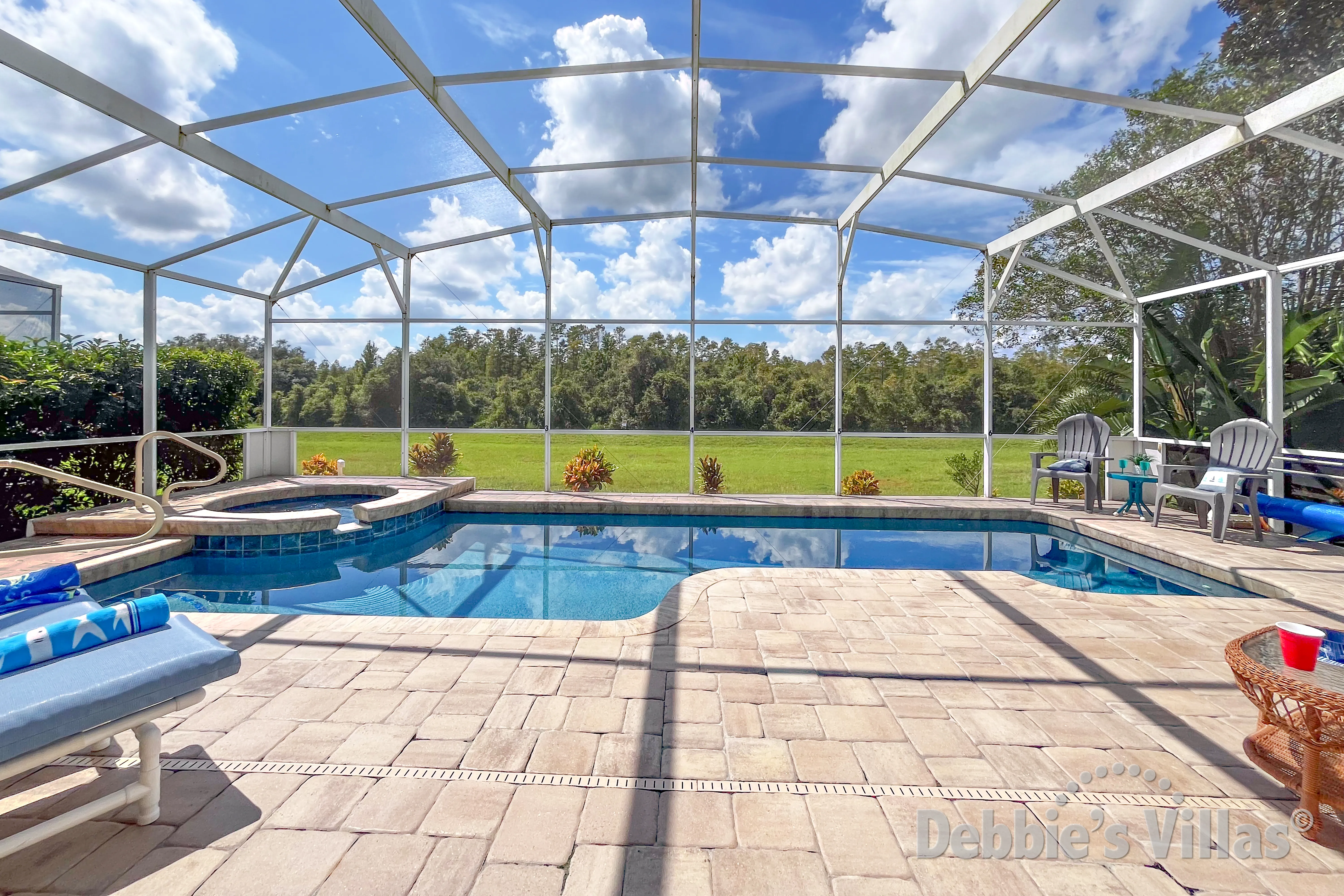West-facing pool and spa at this vacation villa on Highlands Reserve in Davenport
