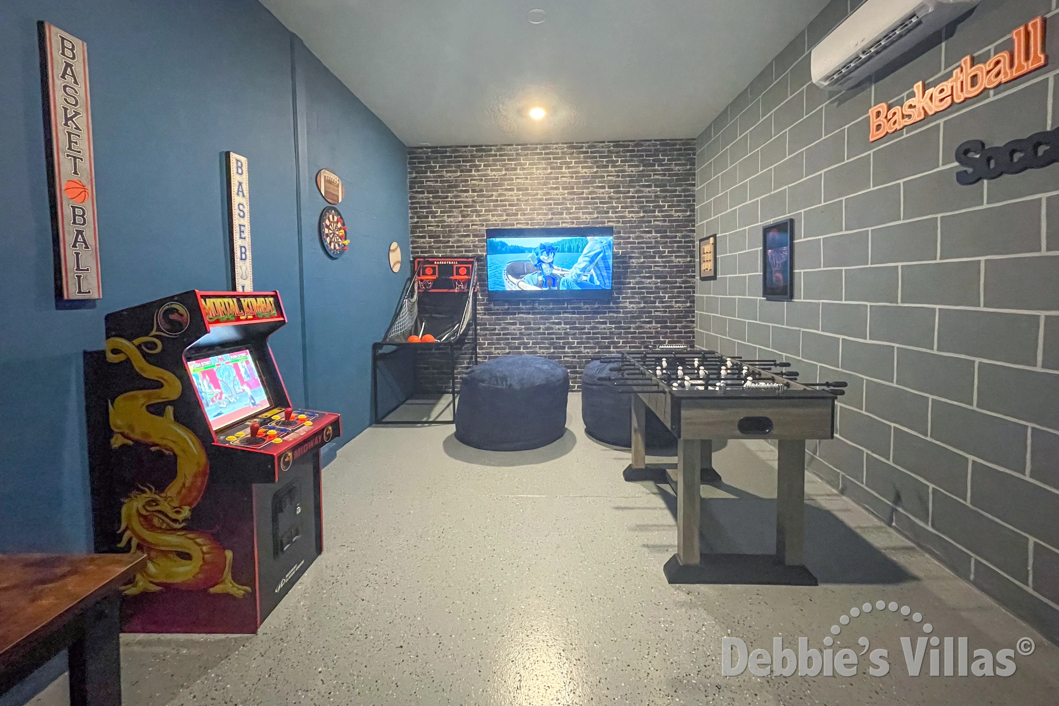 Fun for young and old in the games room of this ChampionsGate vacation villa