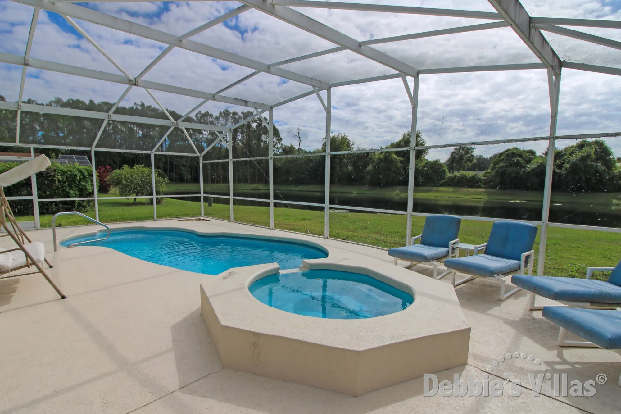 Lake view from the south-facing private pool and spa at this villa in Kissimmee