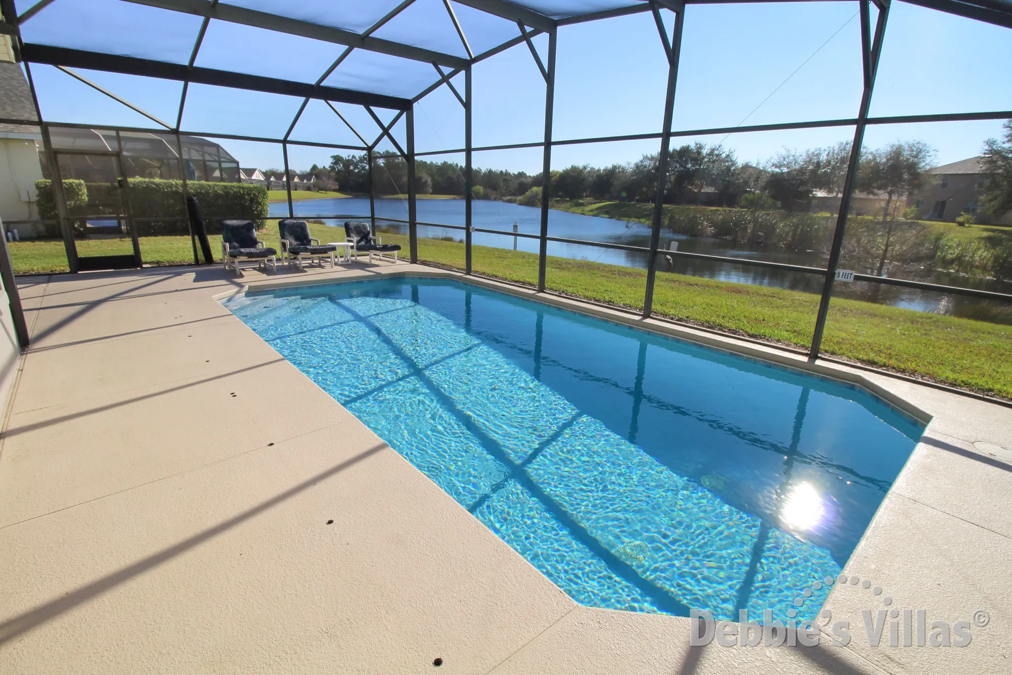 Large southeast-facing pool deck with lake view on the Clermont community of Glenbrook