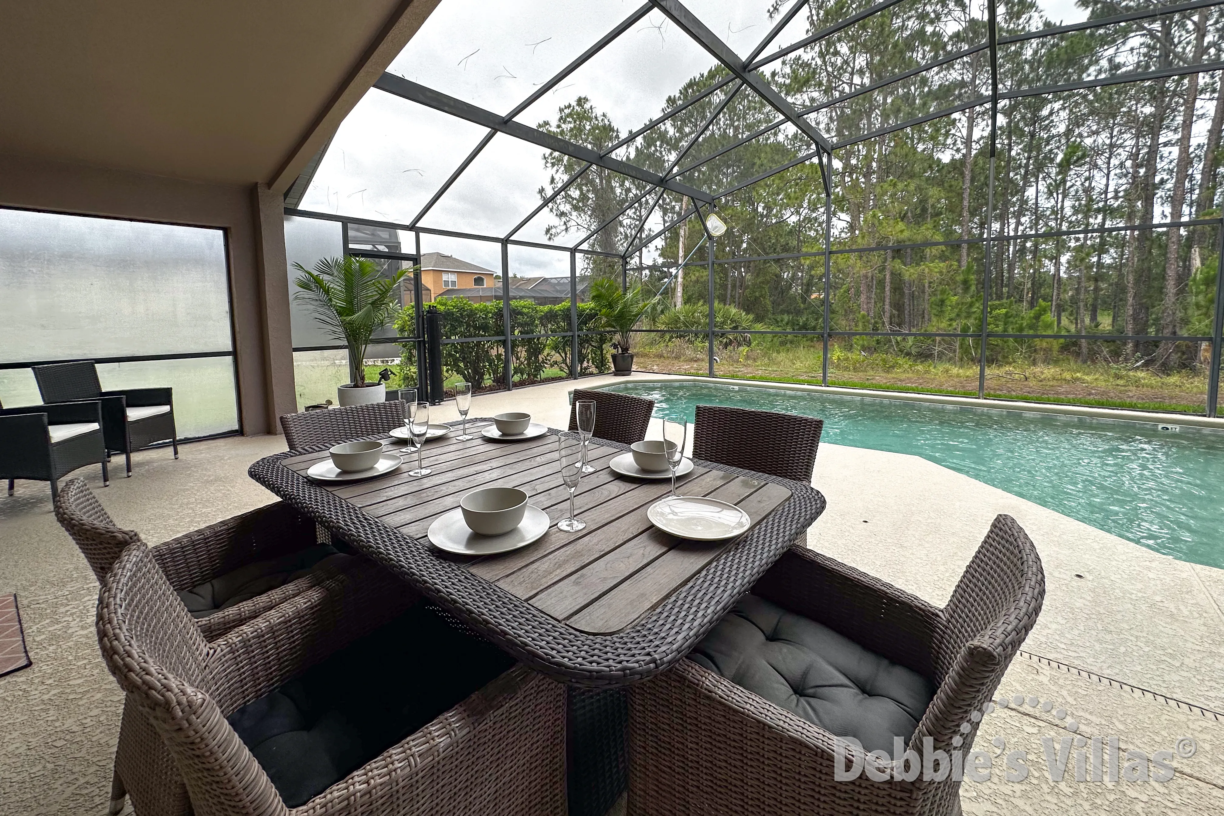 Dine alfresco at the covered dining table