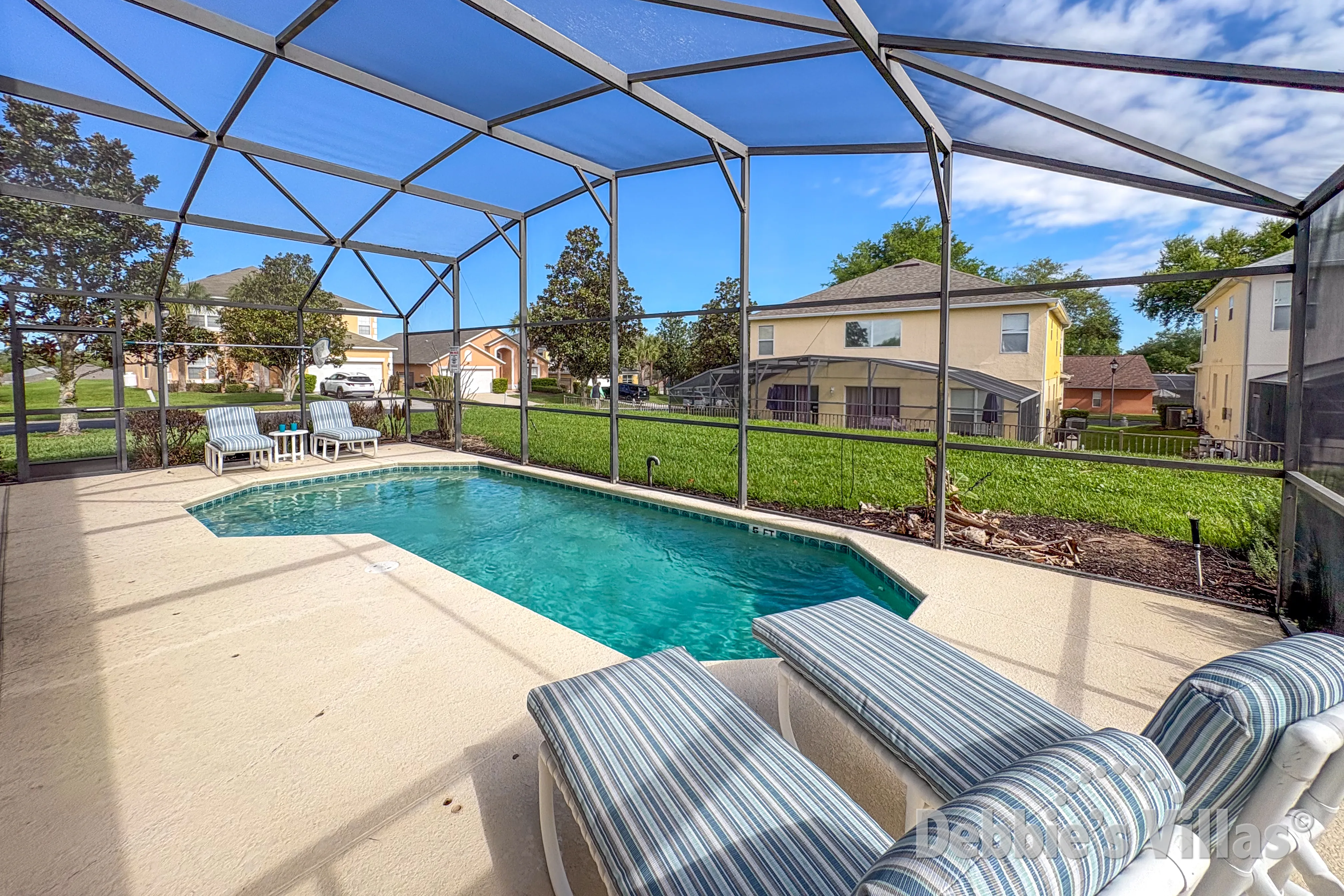 Sunny pool at this vacation villa on Emerald Island in Kissimmee 