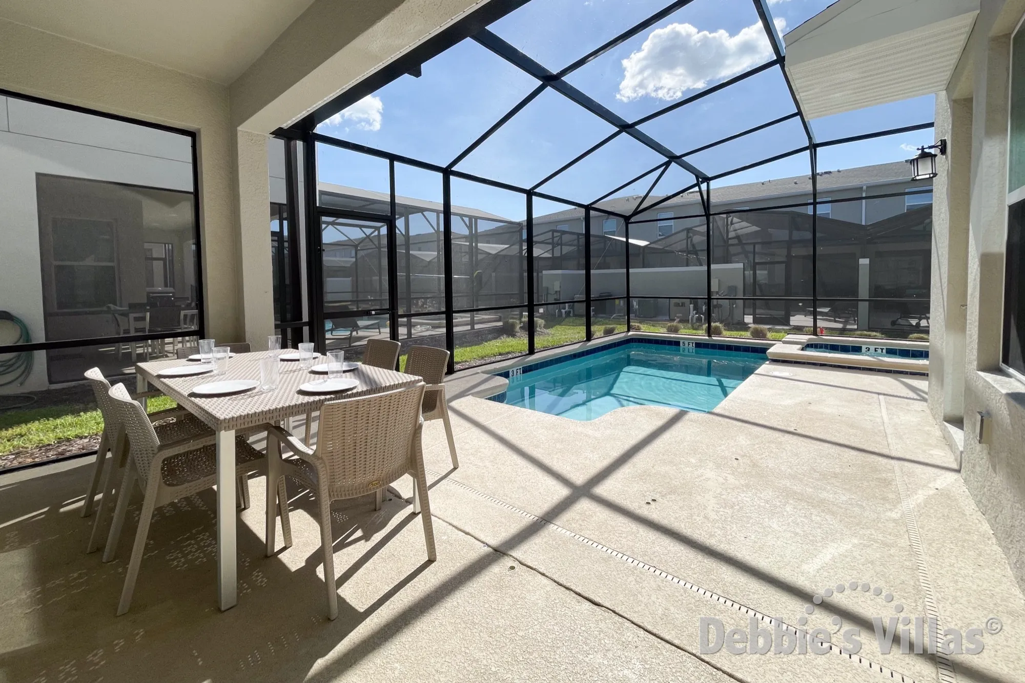 South-facing pool and spa at this vacation villa on Storey Lake in Kissimmee