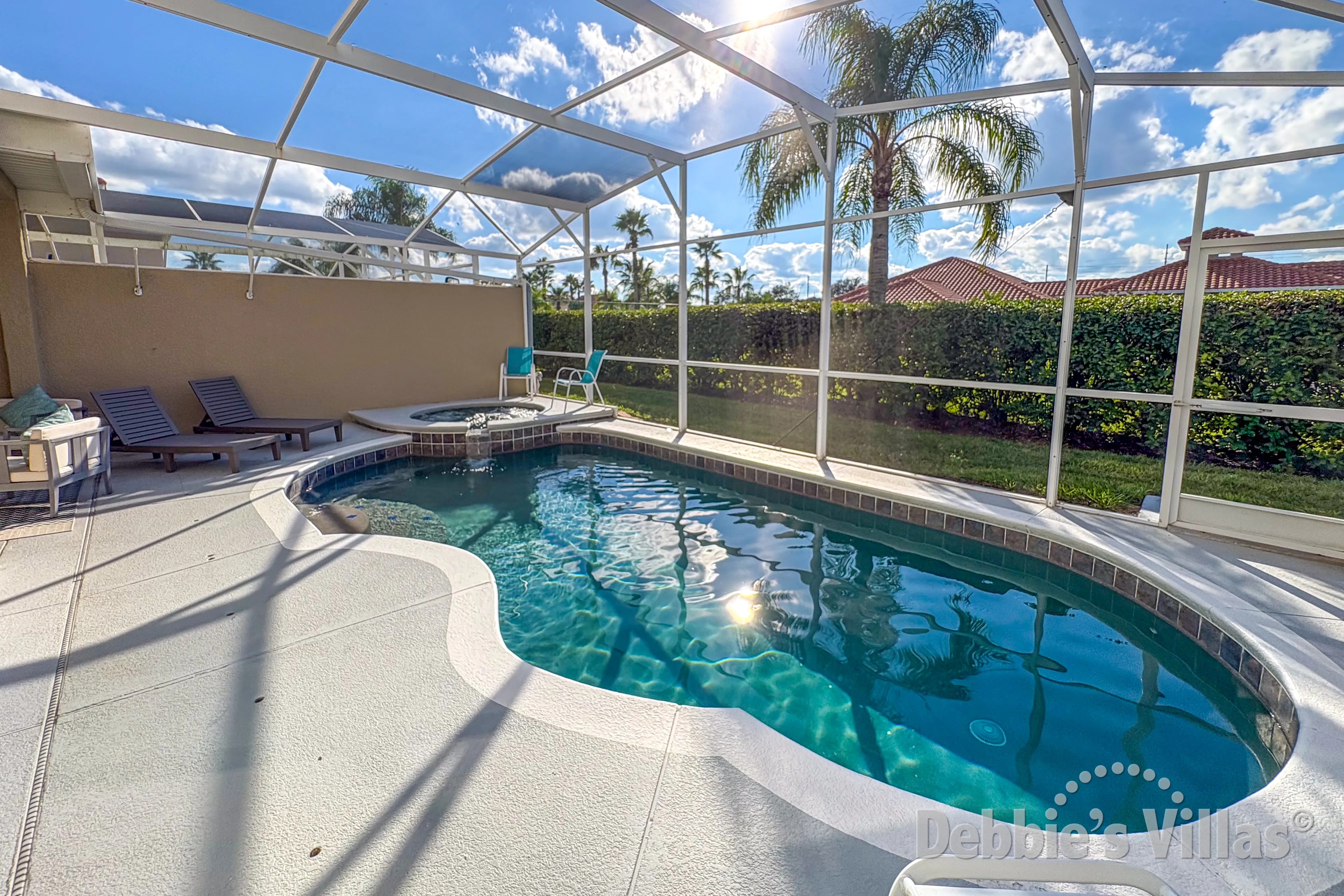 West-facing pool and spa at this vacation villa on Tuscan Hills in Davenport