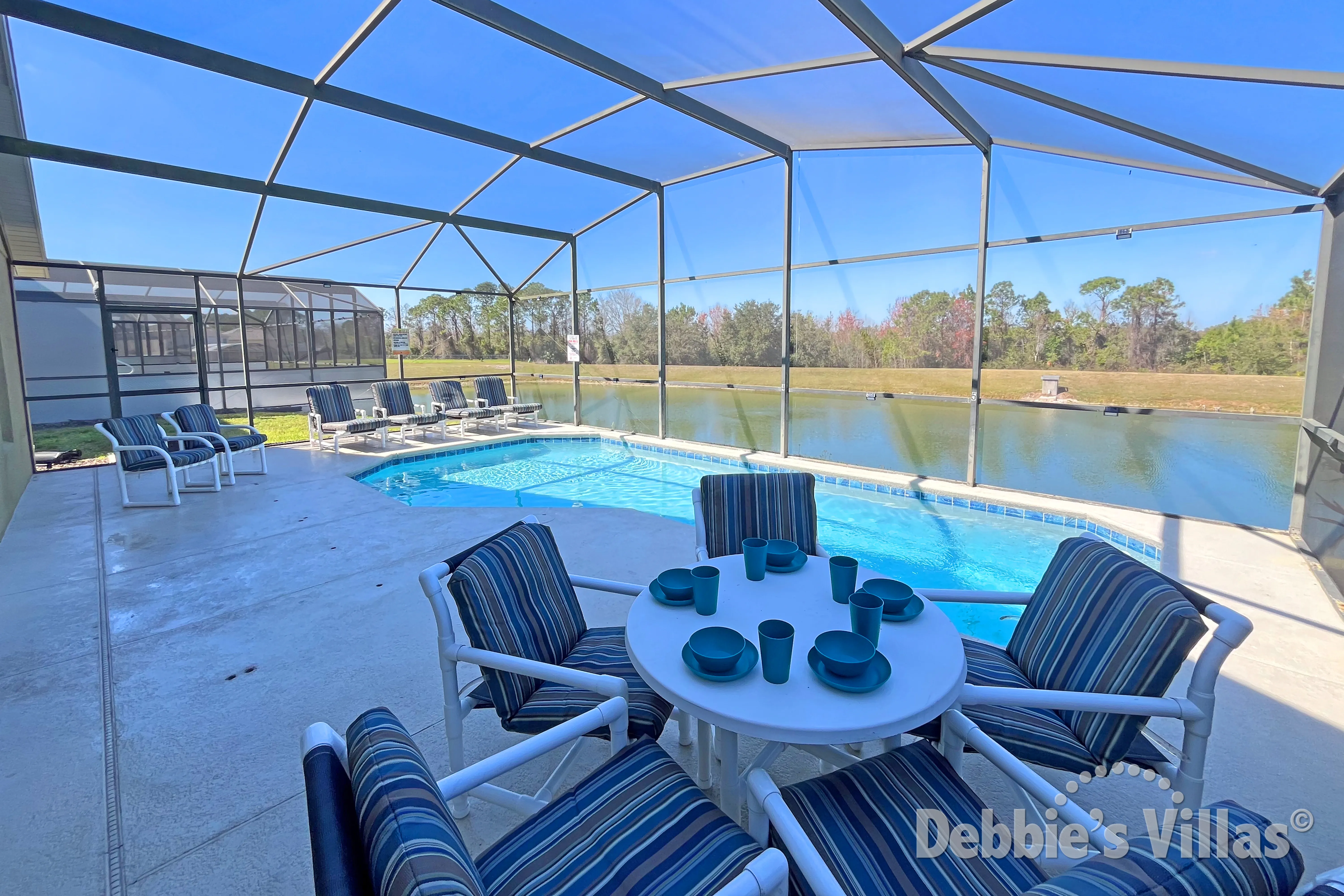 Plenty of seating at the private pool at this Kissimmee vacation villa